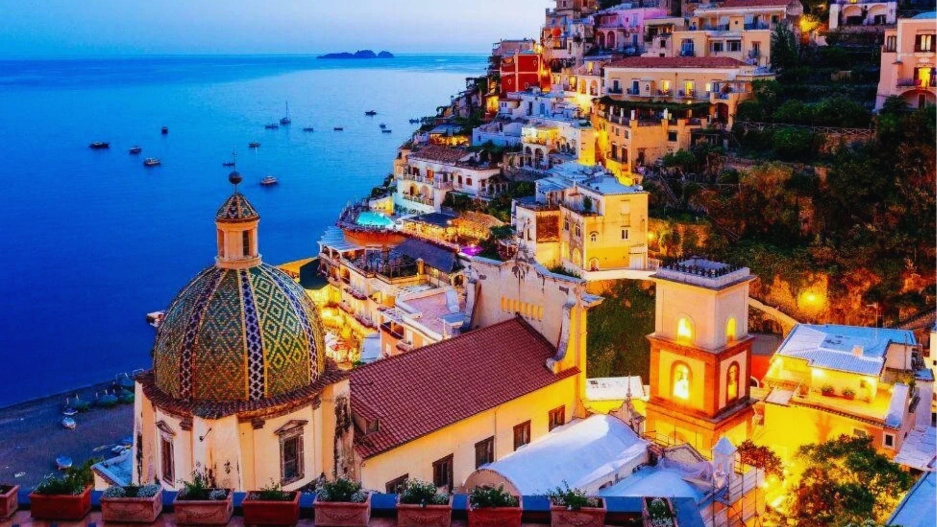 Scenic view of the Amalfi Coast, showcasing its stunning cliffs, vibrant villages, and sparkling blue waters.