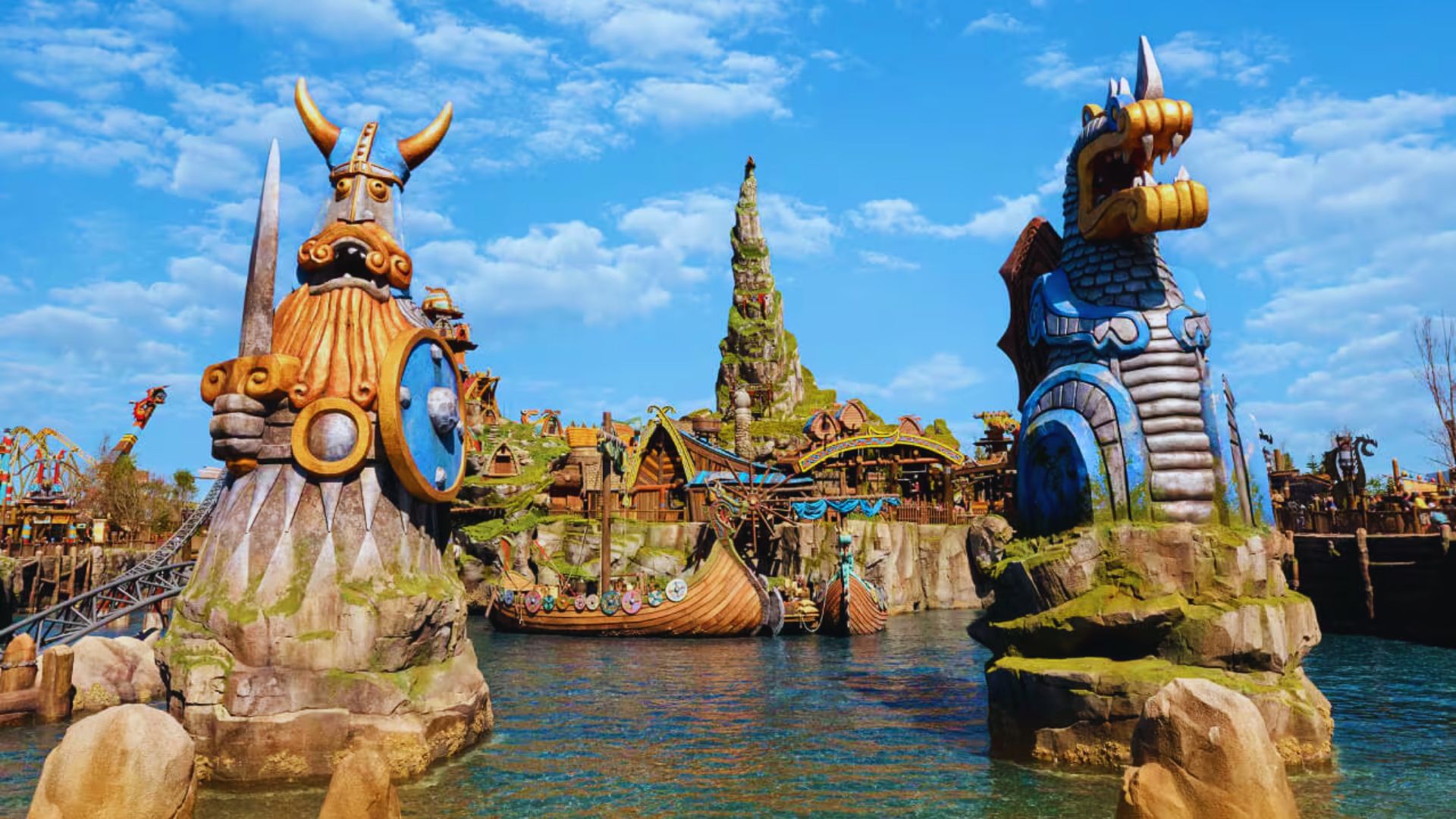 A vibrant view of Disneyland Paris, showcasing iconic attractions and colorful landscapes filled with visitors enjoying the park.