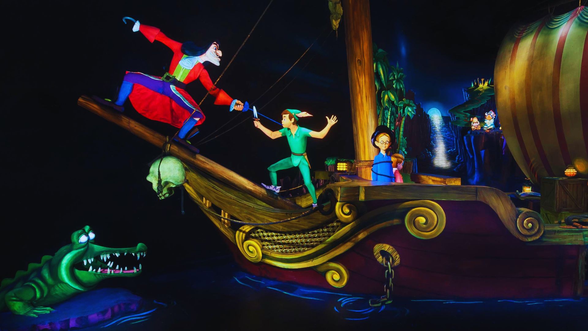 A scene from Disneyland's Pirates of the Caribbean ride, showcasing a pirate ship and animated figures in a vibrant atmosphere.
