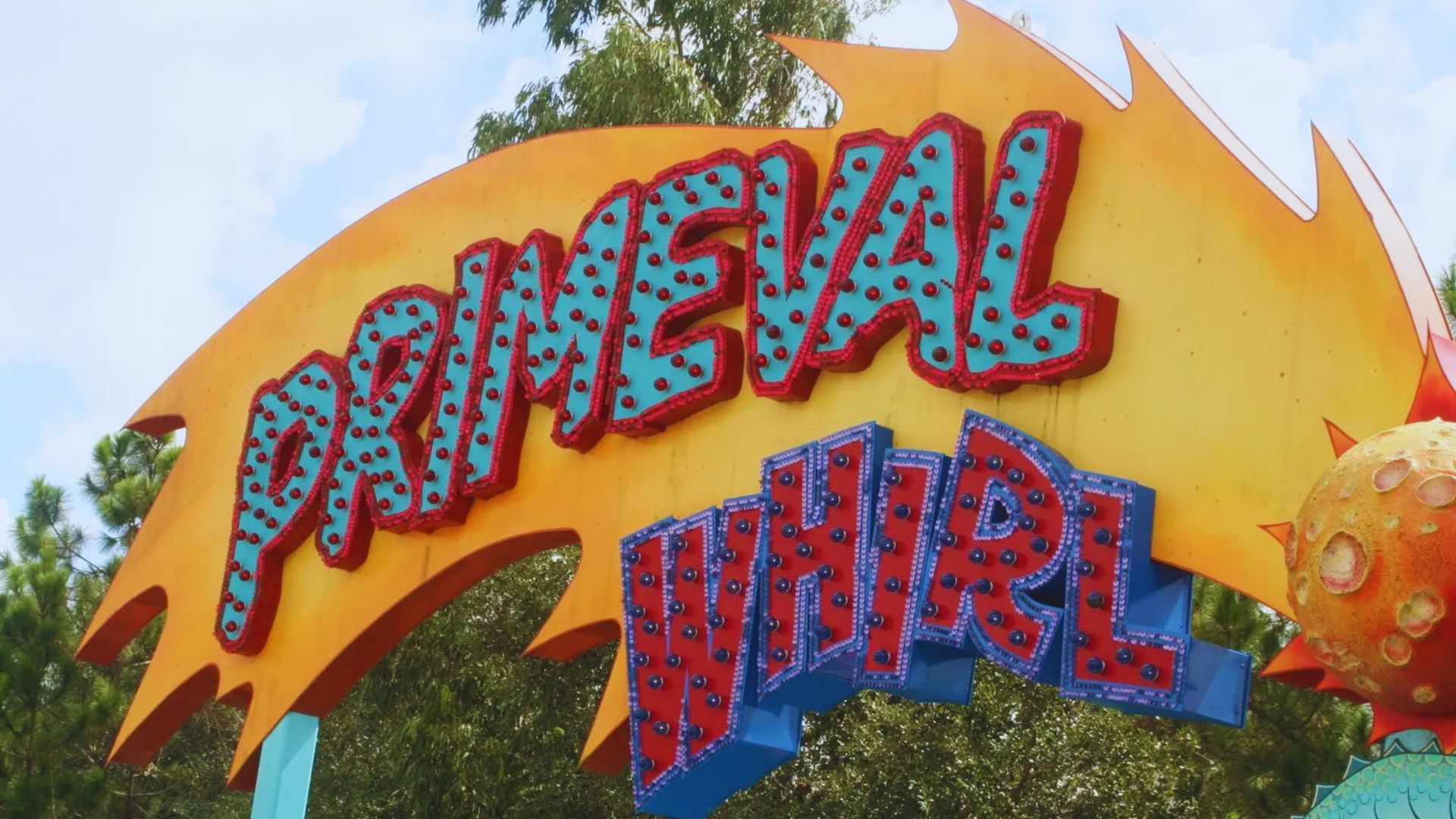 A colorful sign for a water park displaying the words