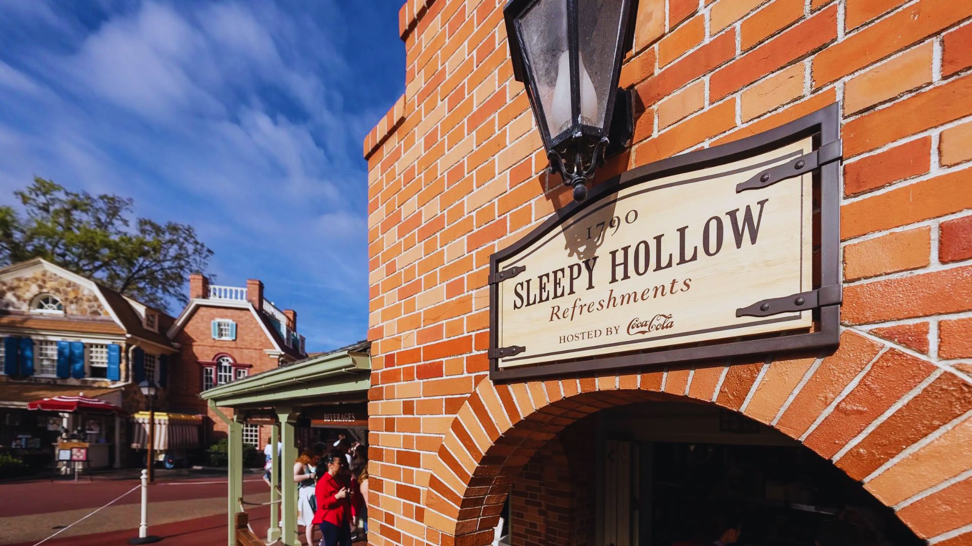 A brick building featuring a sign that reads