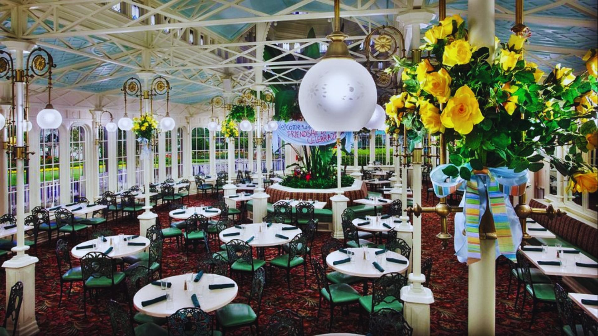 Elegant dining room at the Grand Floridian Resort, featuring ornate decor and luxurious furnishings.
