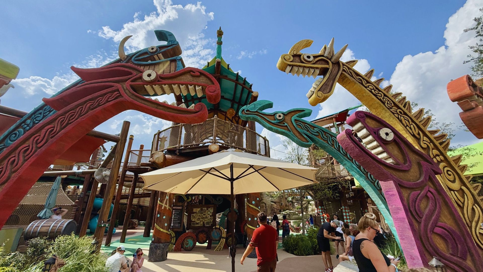 The dragon ride at Disney's Epcot, showcasing vibrant colors and joyful guests experiencing the magical adventure.