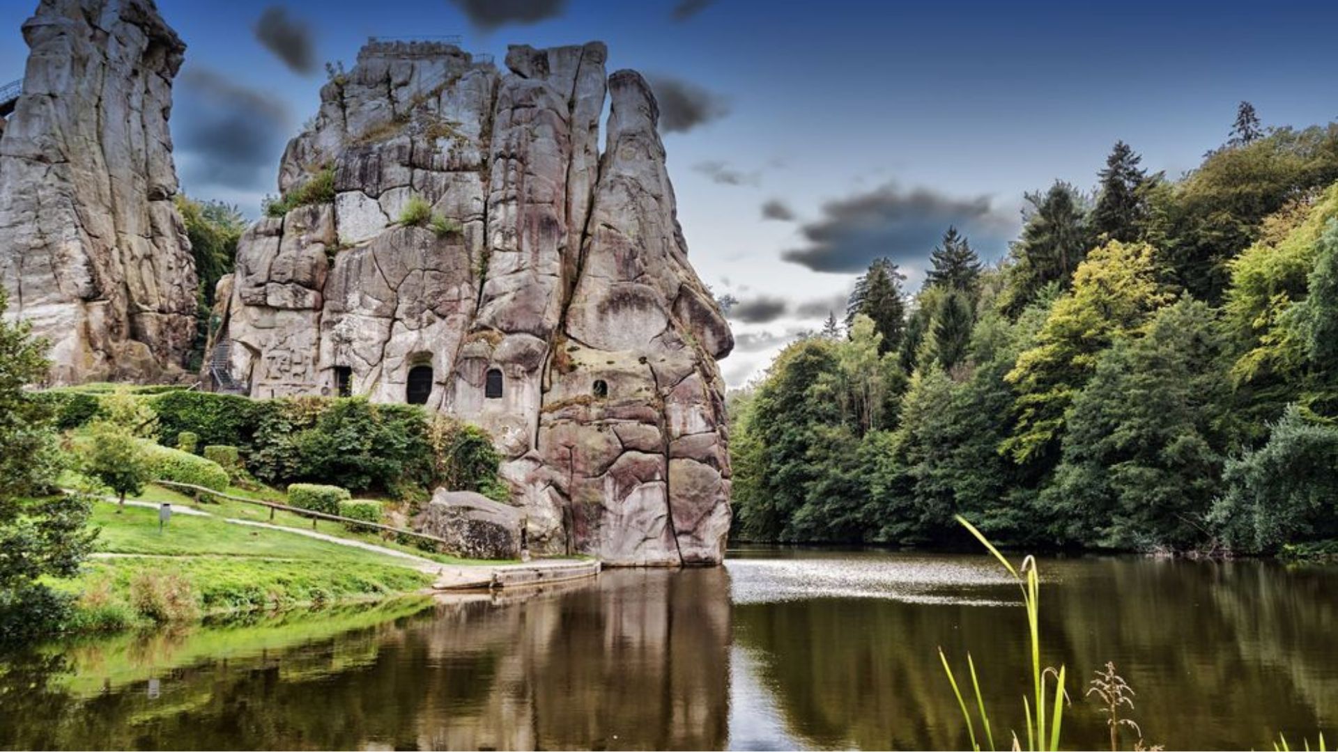 Large rock formations tower over the landscape in the park, showcasing impressive natural geological features.