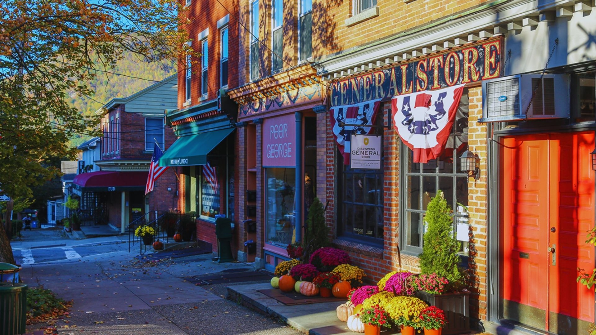 A city street scene with a series of shops, highlighting different storefronts and passersby enjoying the area.