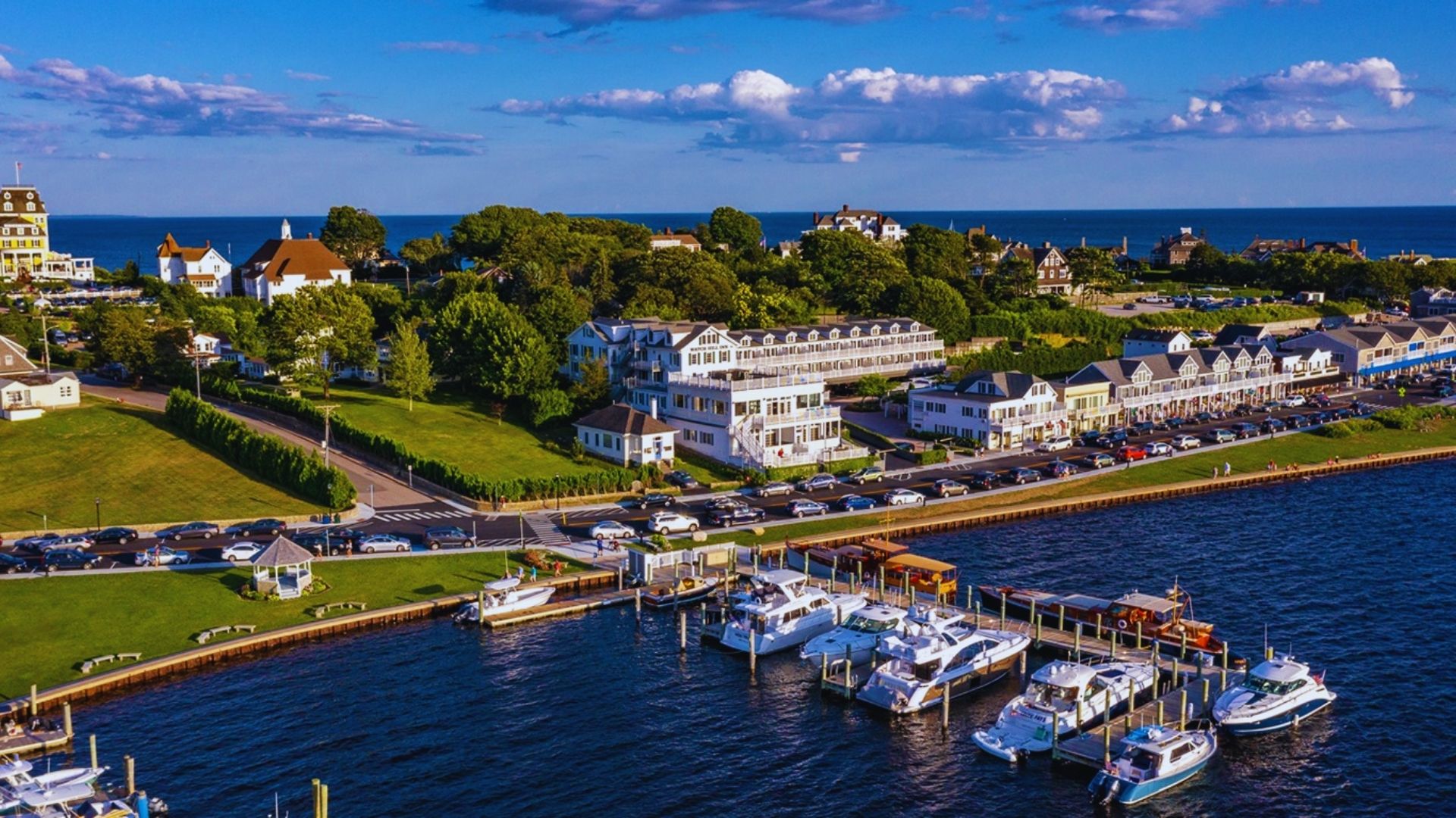 Scenic view of the harbor and marina at the Inn at the Cove in Cape Cod, Massachusetts, with boats and calm waters.