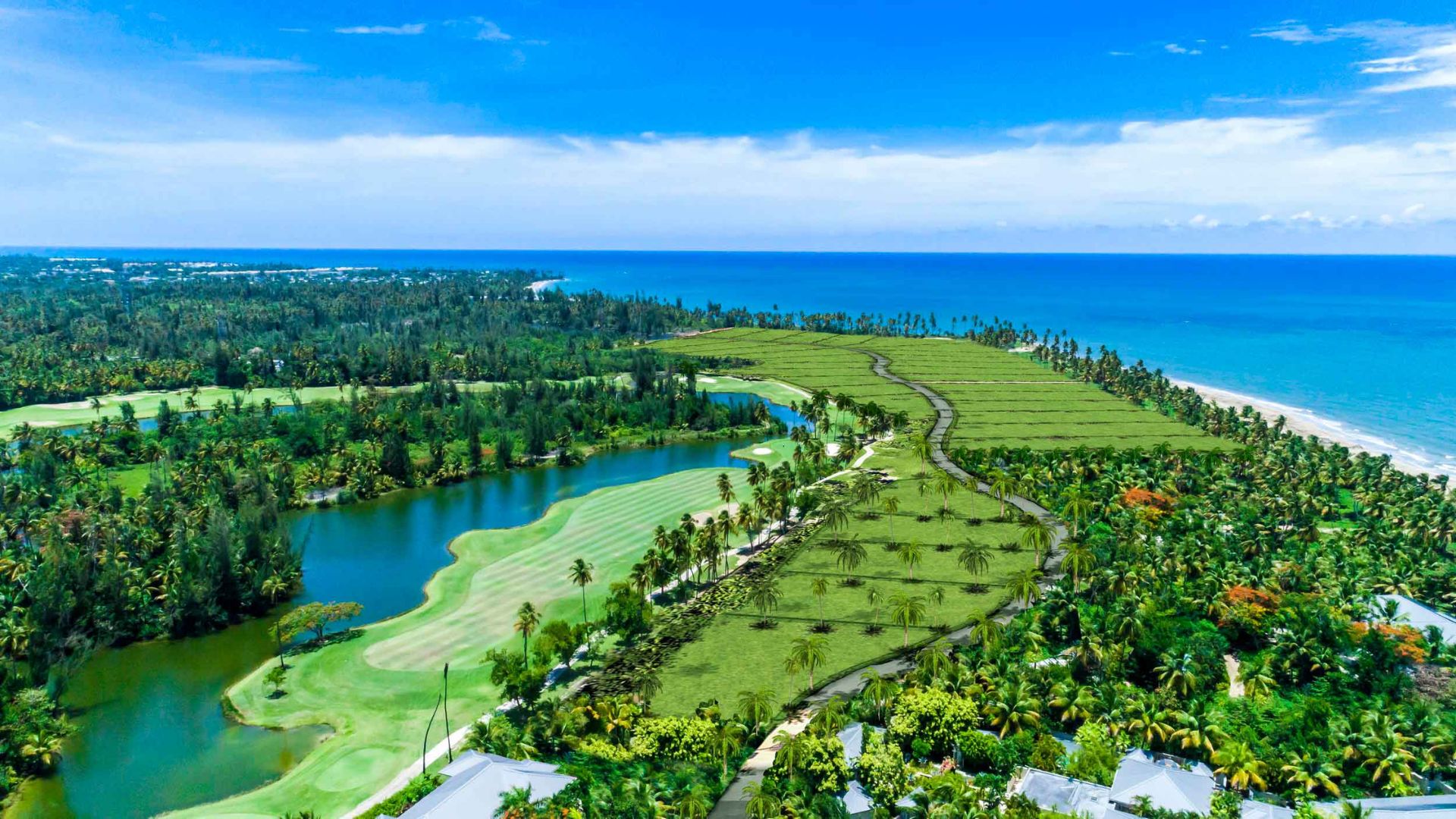 Scenic view of a golf course and resort in Thailand, featuring lush greens and tropical surroundings.