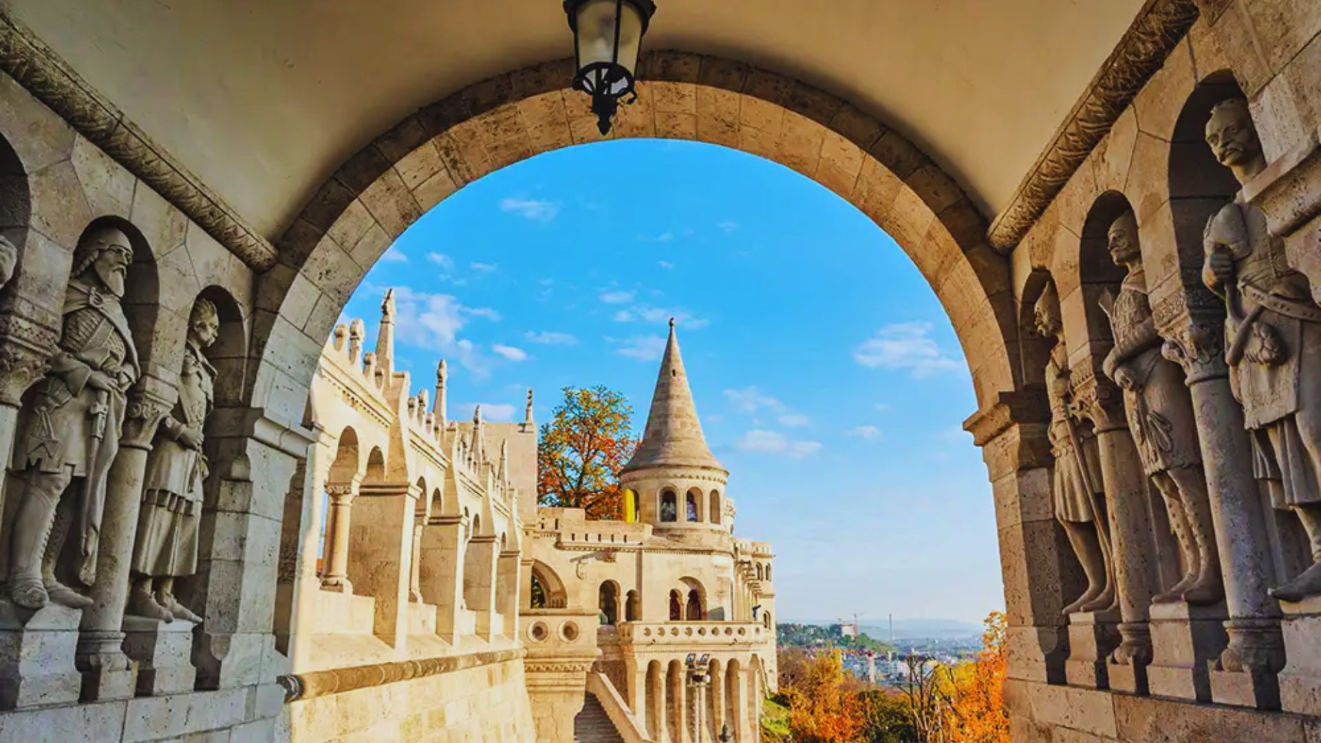 Budapest Castle overlooks the cityscape, showcasing historic architecture against a vibrant urban backdrop.