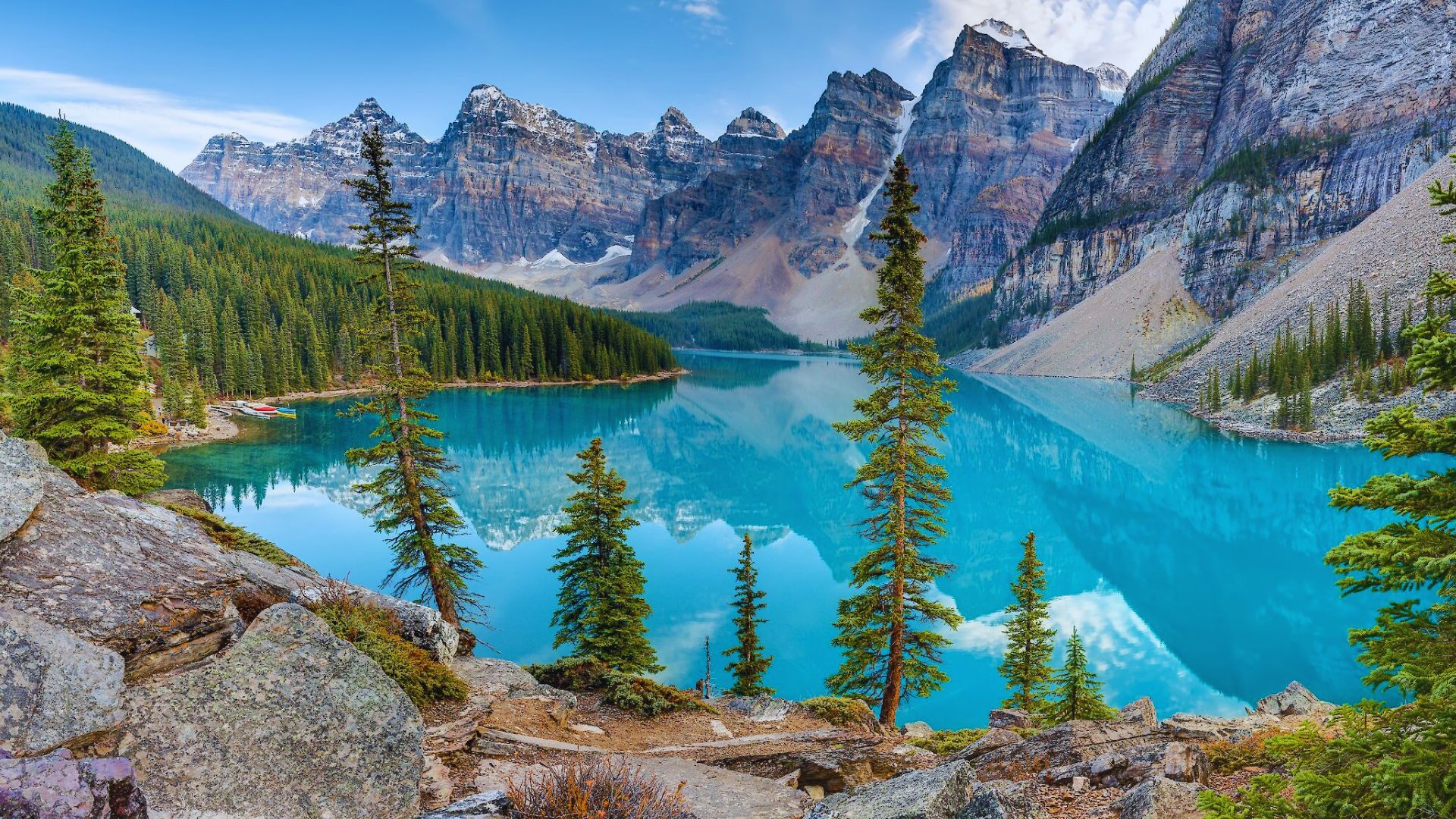 Moraine Lake in Banff National Park, Canada, showcasing stunning turquoise waters surrounded by majestic mountains