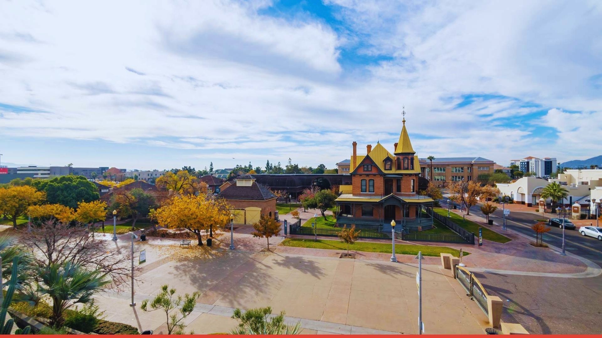 A city skyline featuring a church and a red banner proclaiming, "The Best City in Arizona."