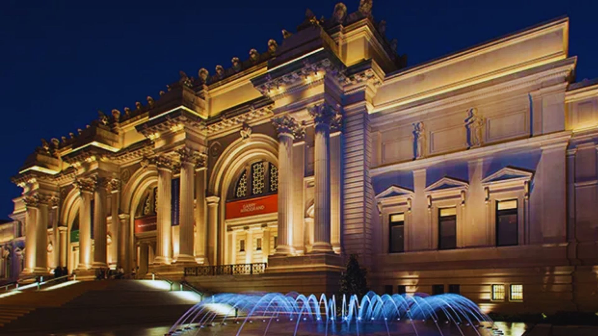 The exterior of the Metropolitan Museum of Art, showcasing its grand architecture and iconic steps.