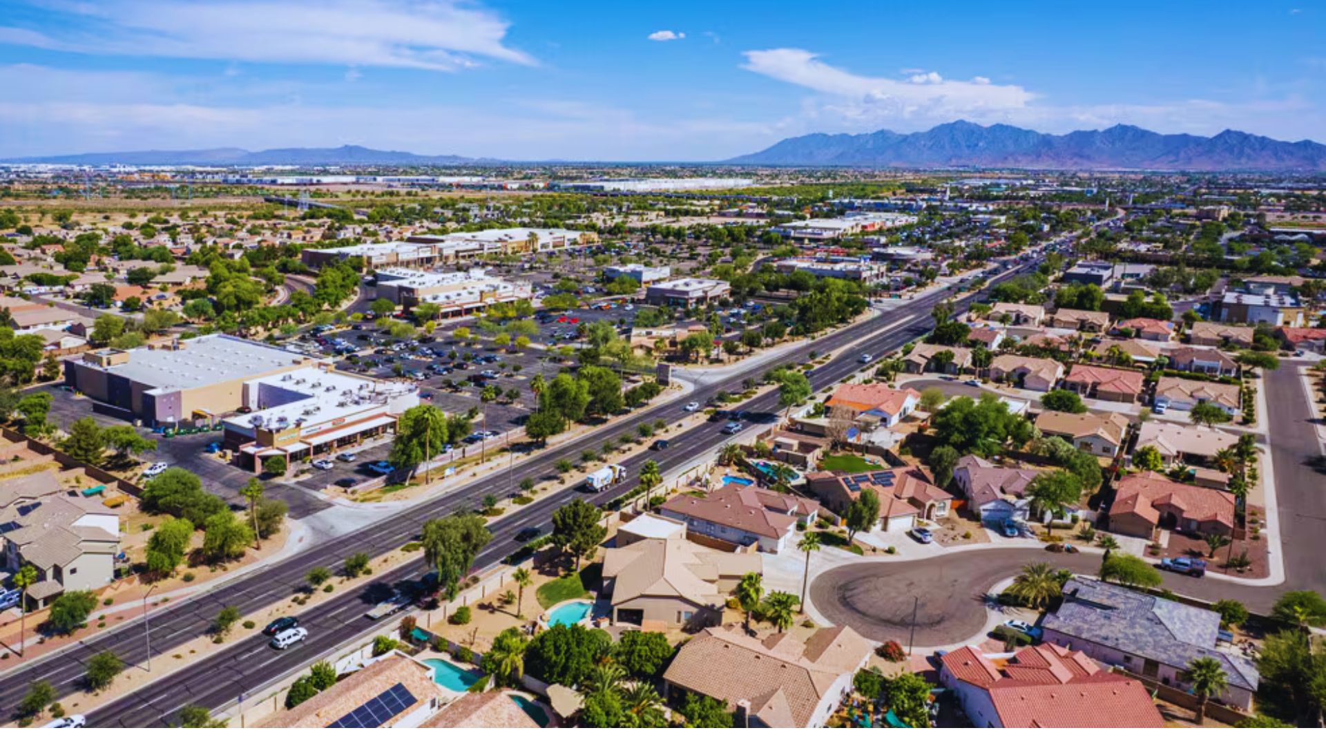 Aerial view of Las Vegas showcasing the iconic Strip and surrounding urban landscape under a clear blue sky