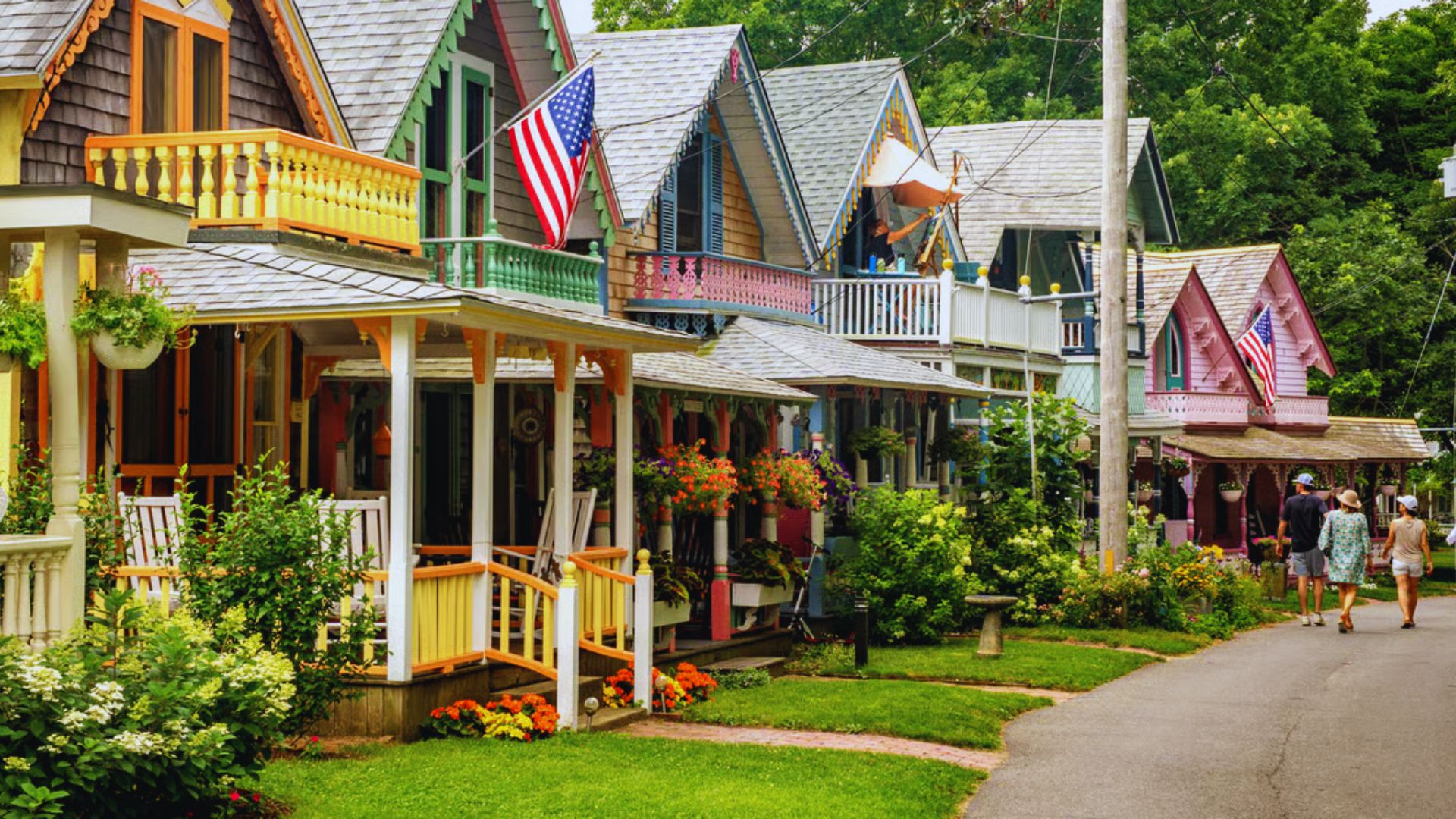 A vibrant row of colorful houses lining a street, showcasing various architectural styles and bright hues.