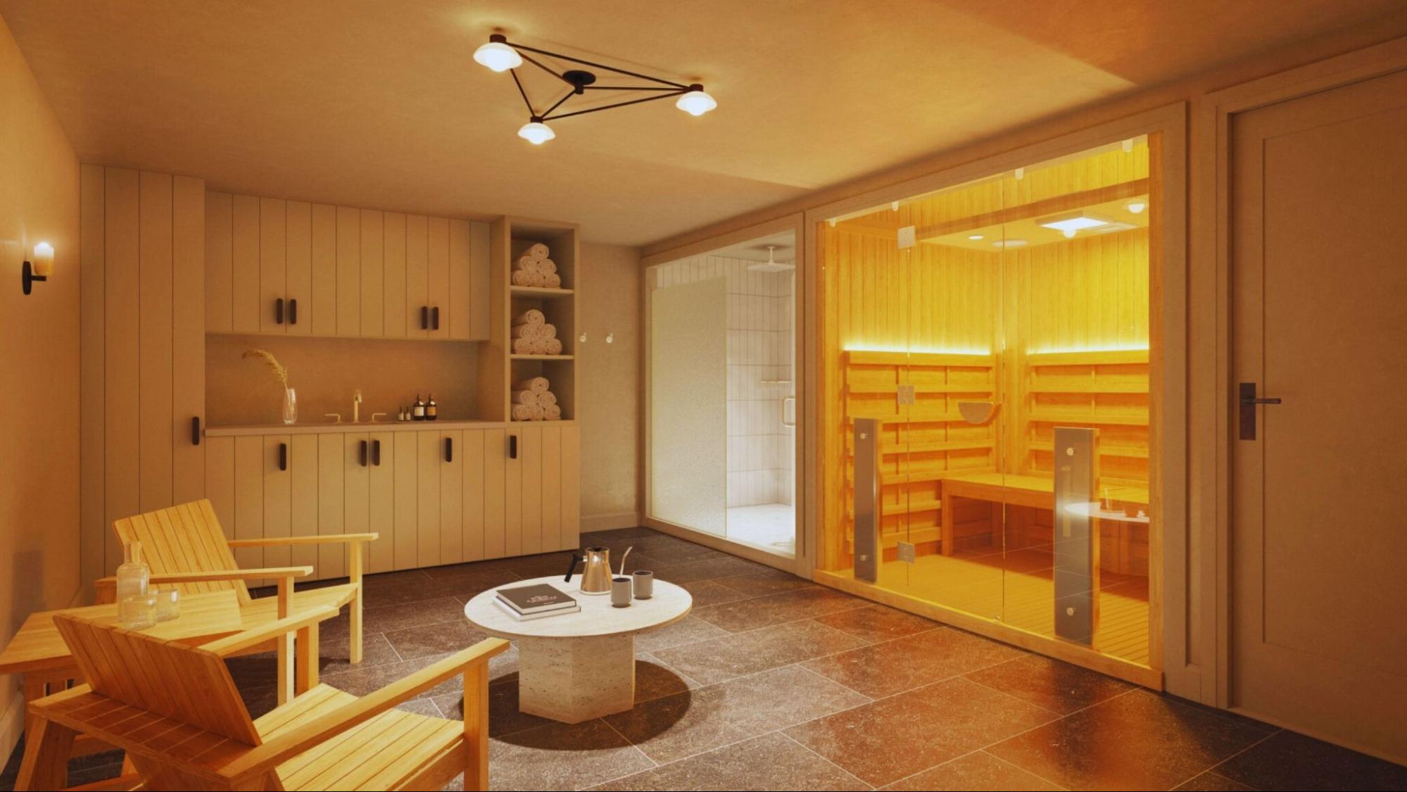 A cozy room featuring a sauna in one corner and a wooden table in the center, creating a relaxing atmosphere.