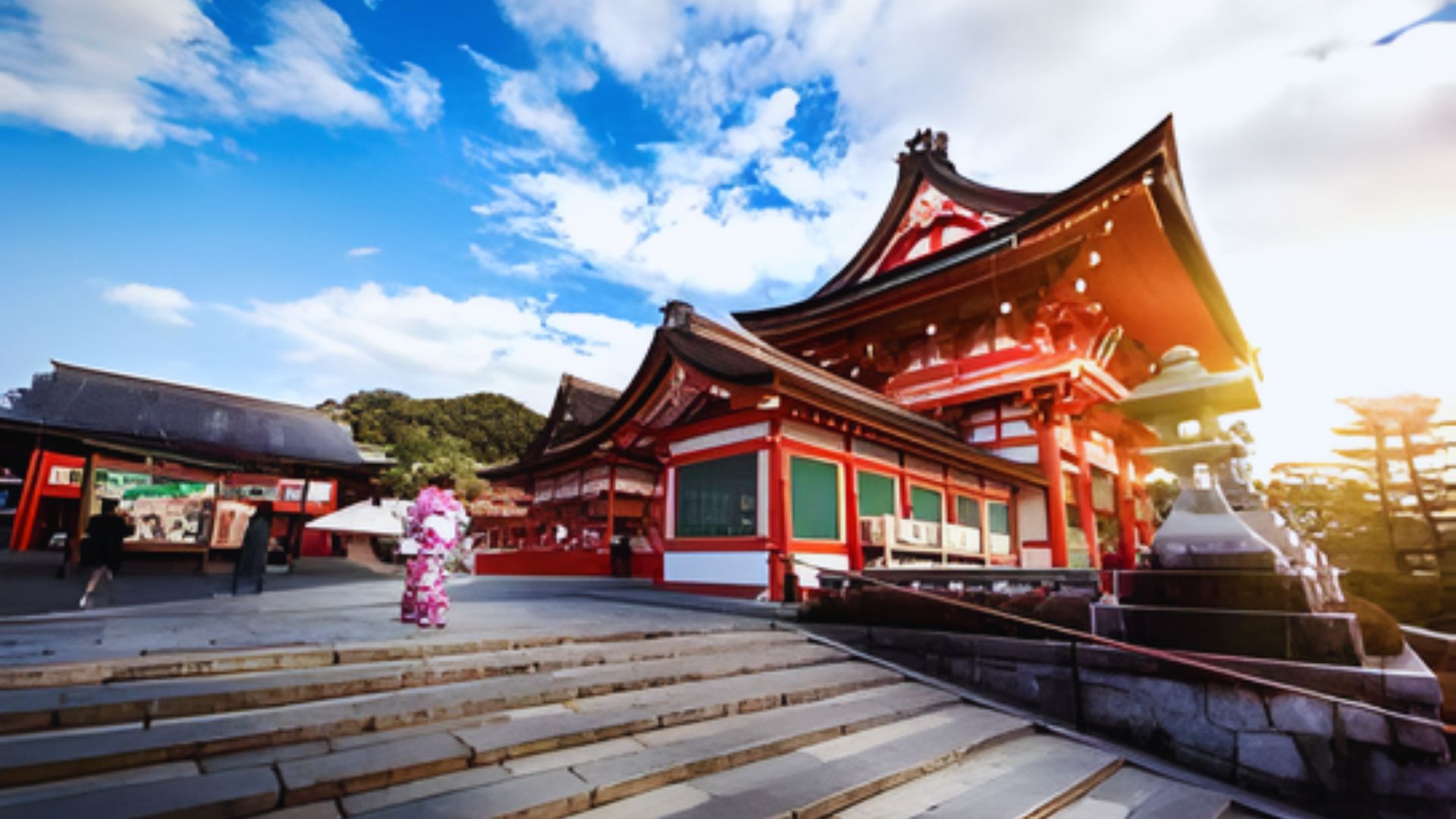 A woman in a traditional kimono ascends the steps leading to a temple, surrounded by serene natural scenery.
