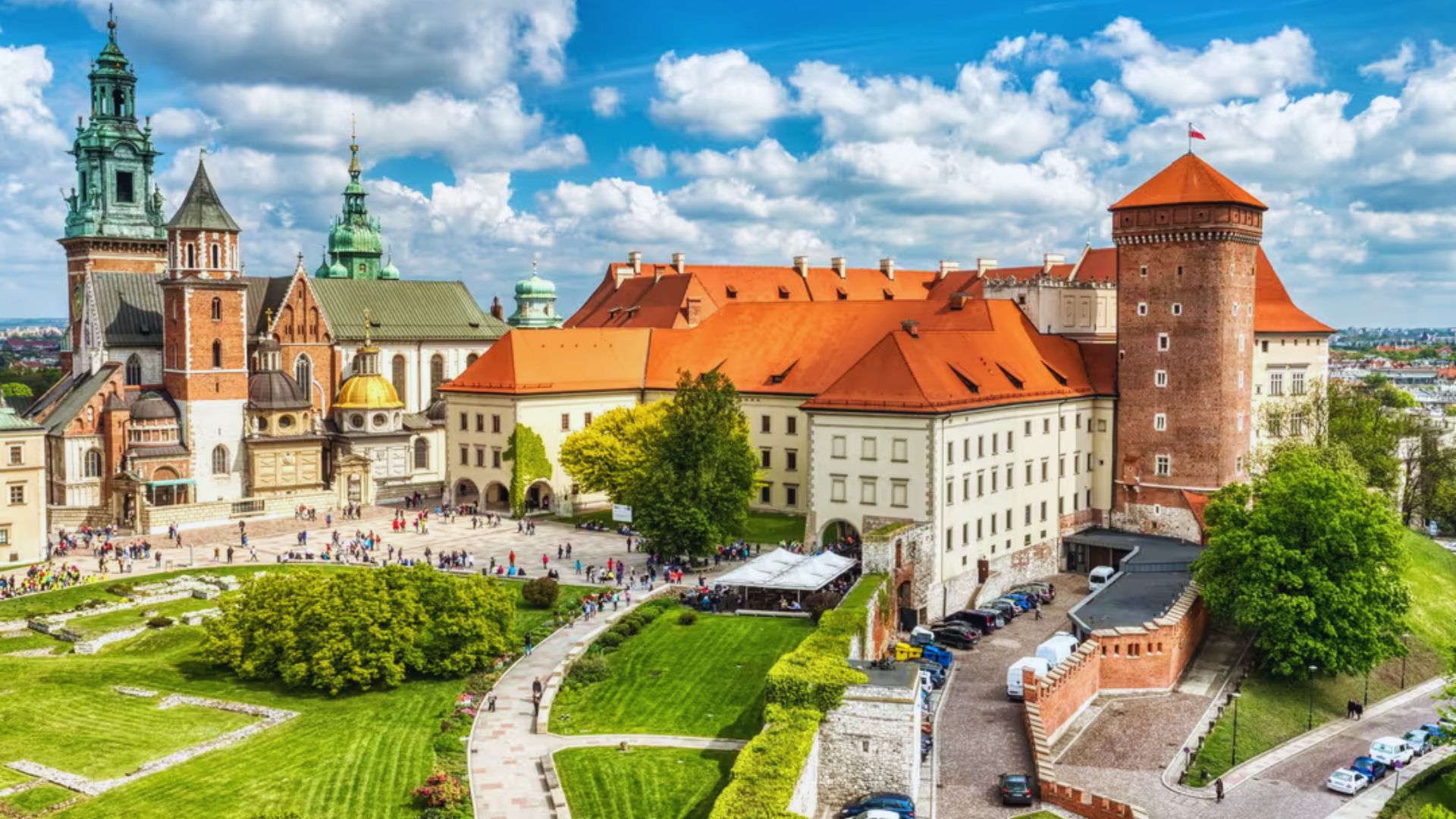 A scenic depiction of Krakow, Poland, highlighting its rich history and beautiful urban landscape with bustling streets.