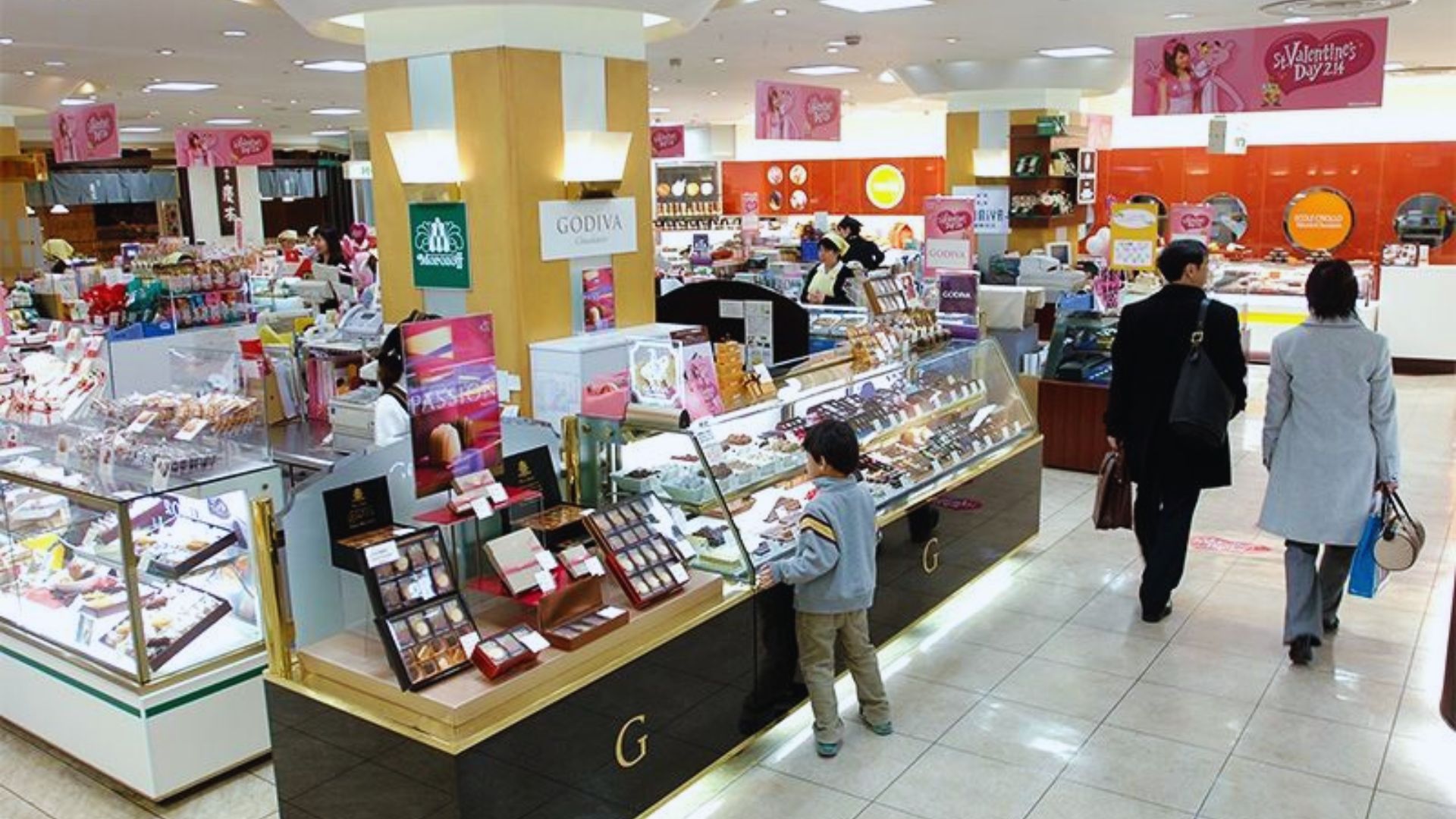 An expansive store crowded with people engaged in shopping activities.