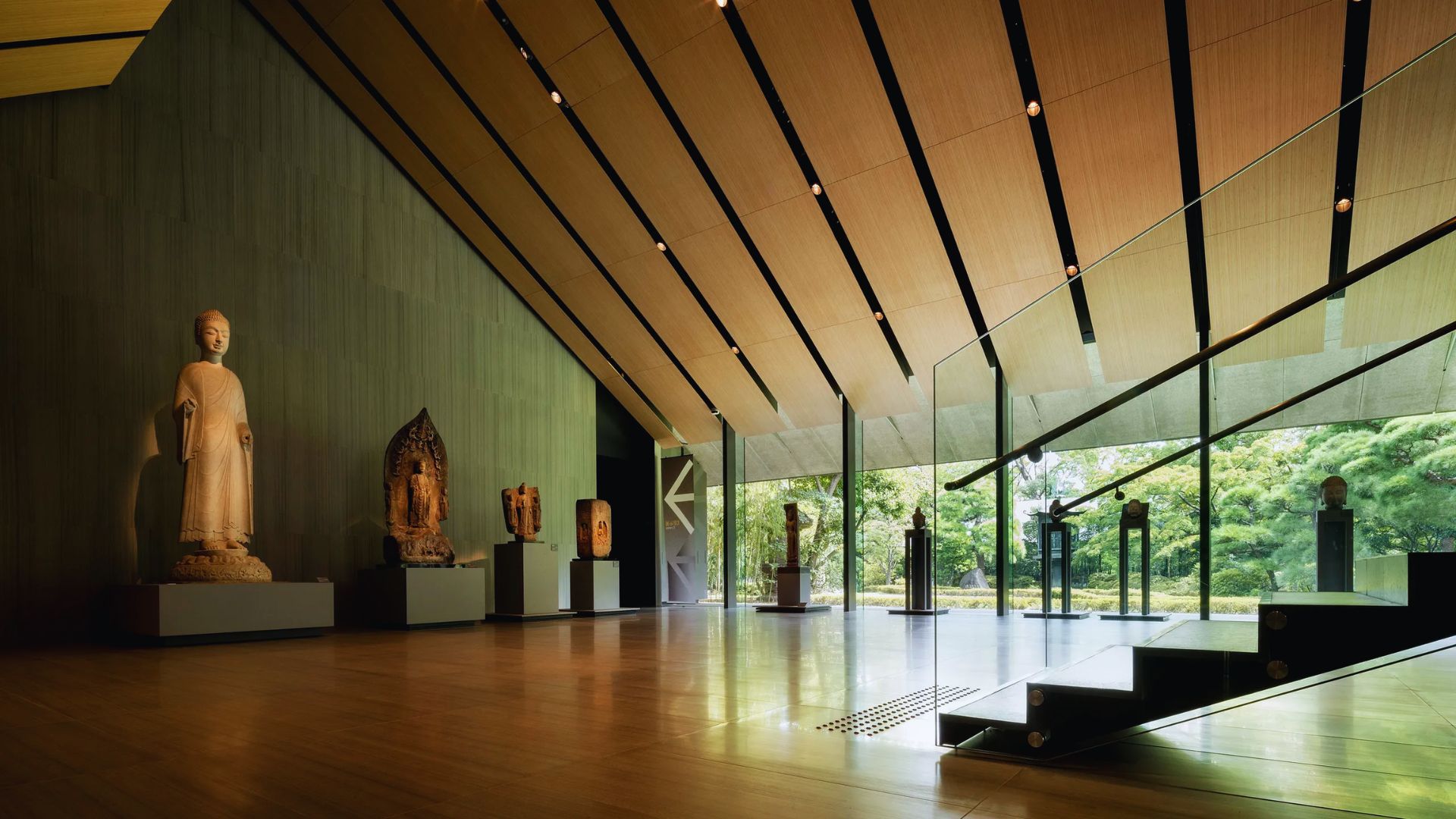 Exterior view of the Museum of Modern Art in New York City, showcasing its modern architecture and surrounding urban landscape.