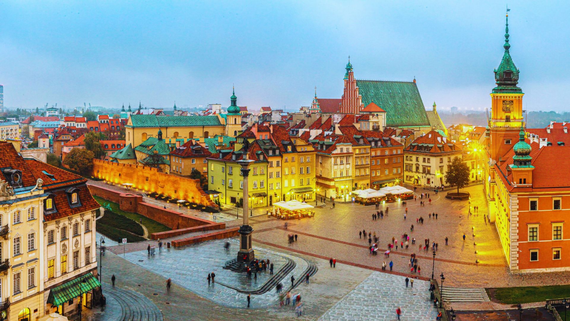 A panoramic view of Warsaw, Poland, showcasing its skyline with modern and historic architecture.