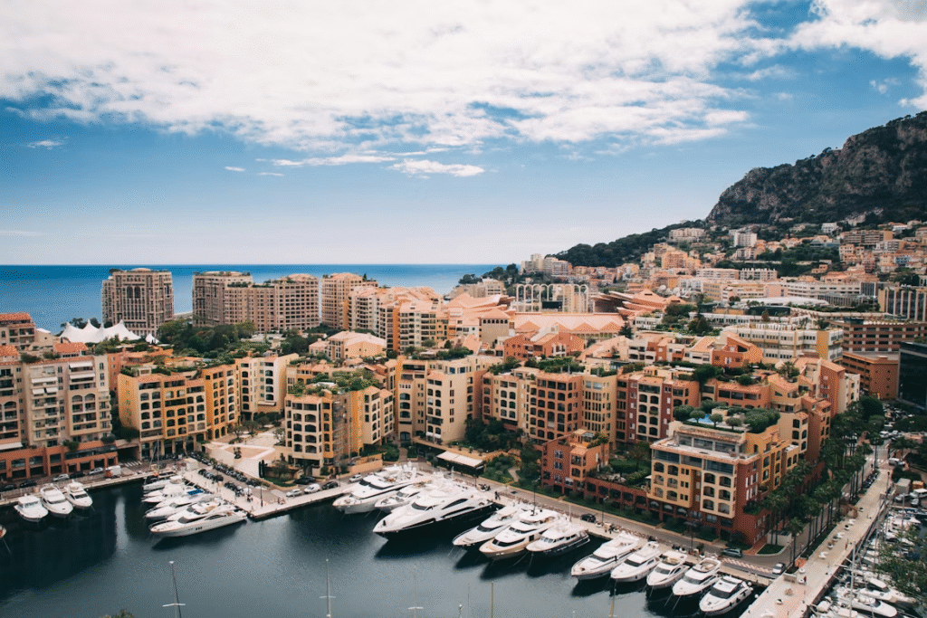 . A panoramic view of Monaco, showcasing its iconic skyline and coastal landscape.