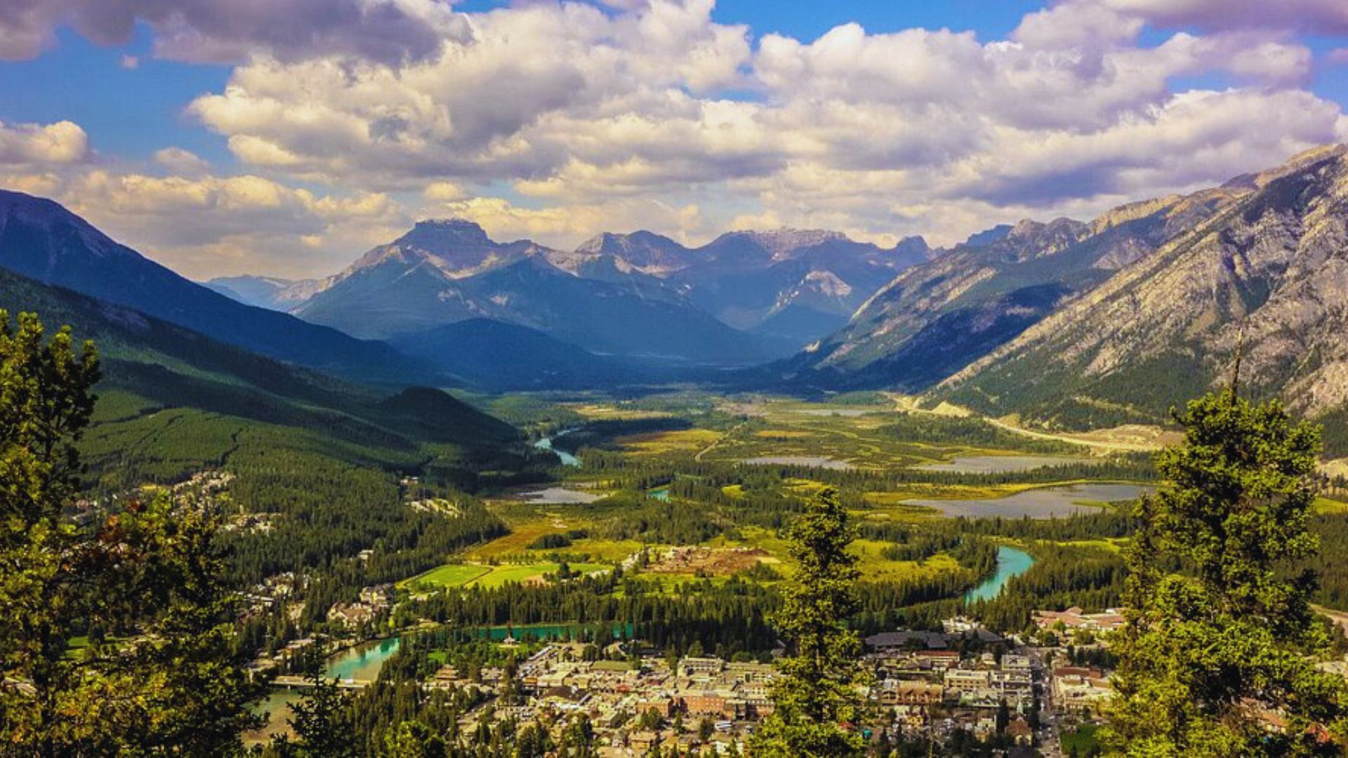 Scenic view of Banff, Canada, featuring the town with majestic mountains in the background.