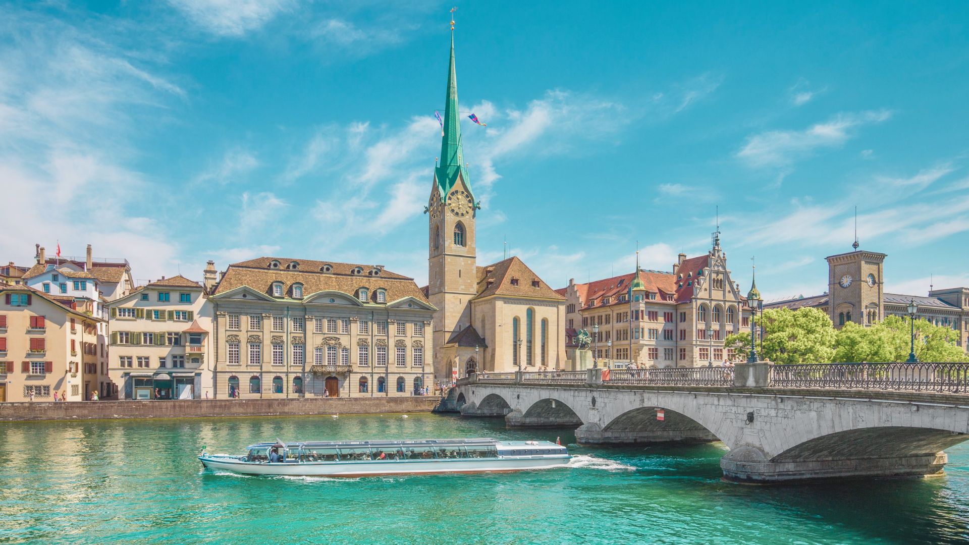 A panoramic view of Zurich, Switzerland, showcasing its historic architecture and scenic lakefront.