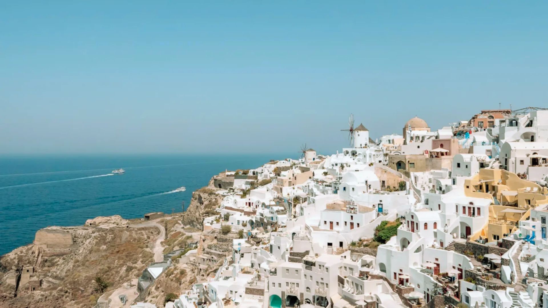 A travel guidebook for Greece, featuring iconic landmarks and cultural highlights for visitors exploring the country.