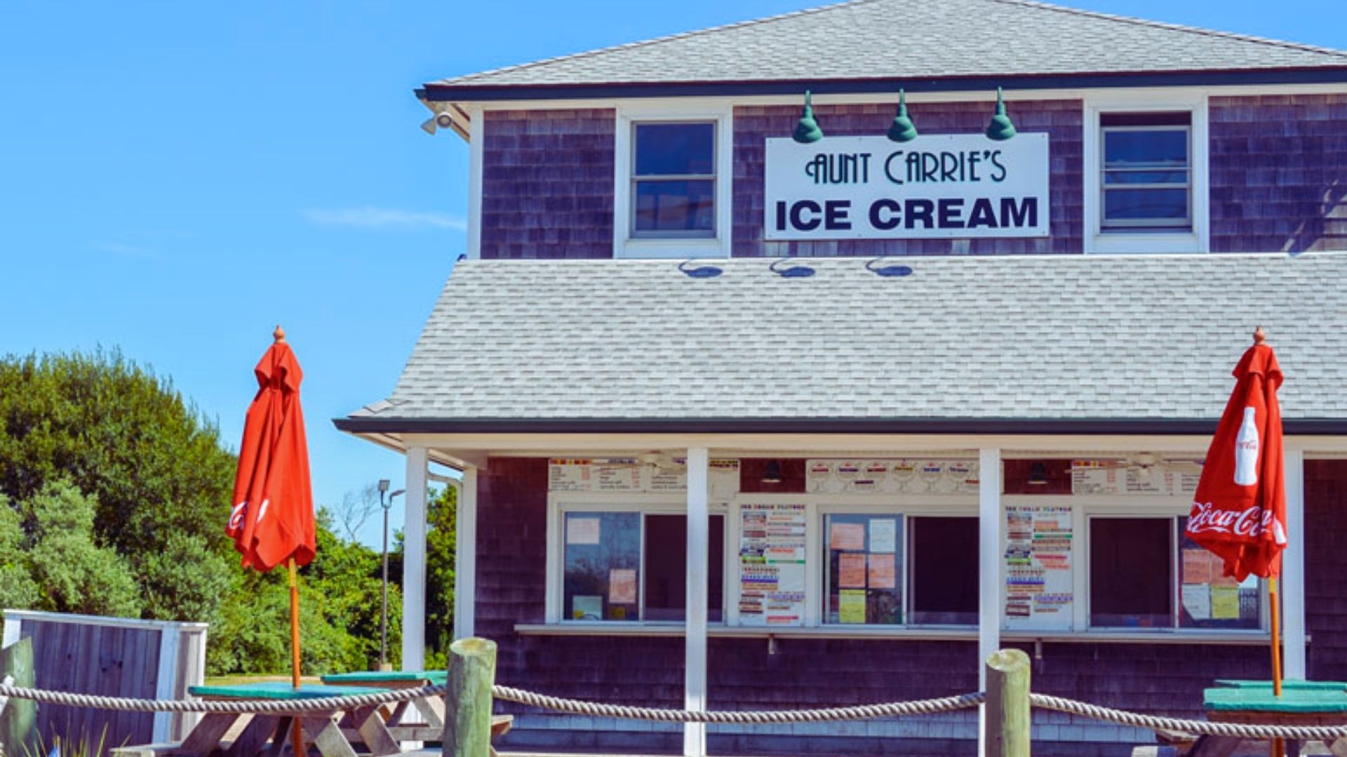 A building featuring a prominent sign that reads "Giant Ice Cream," indicating an ice cream shop.