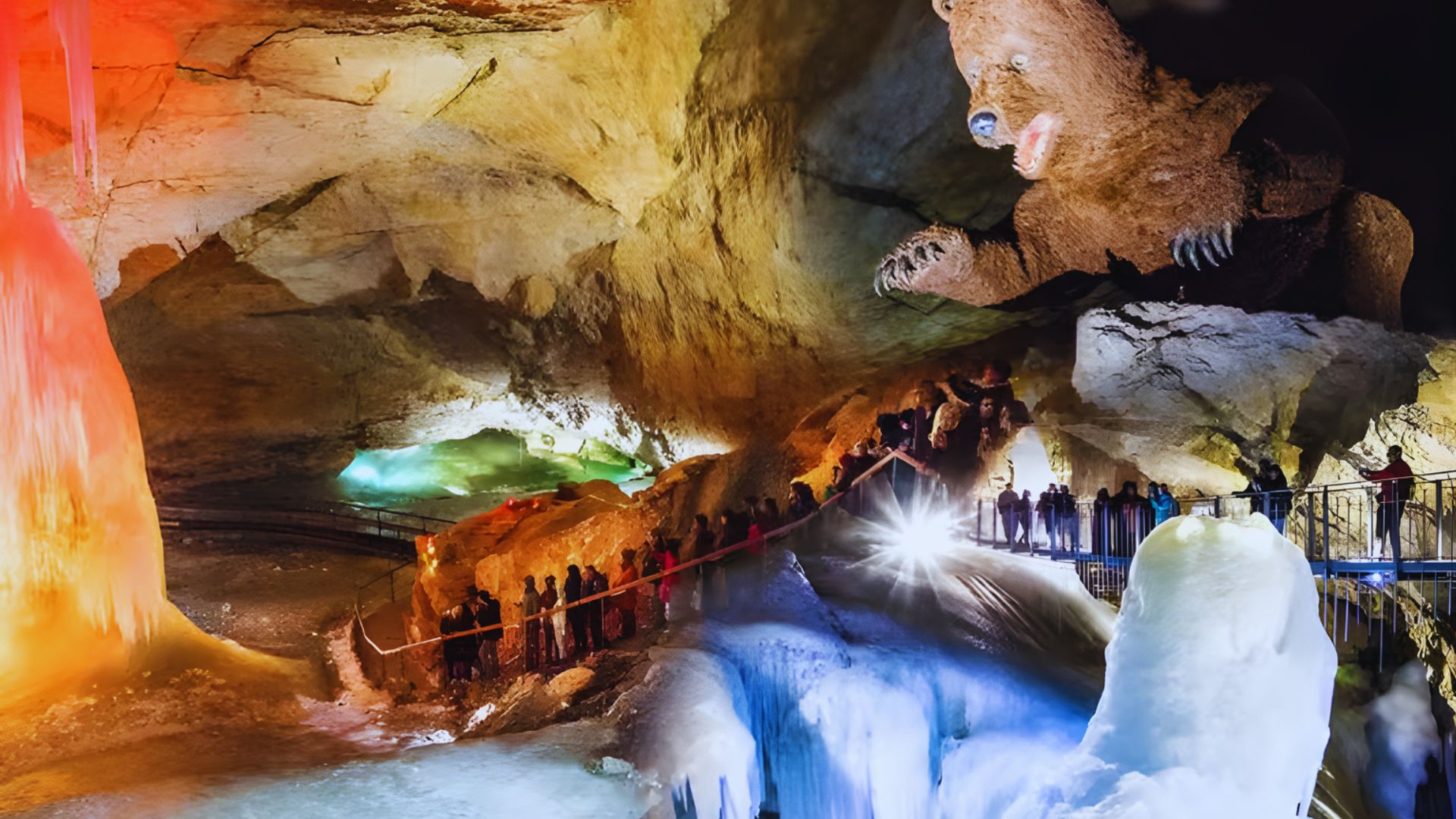 A serene ice cave illuminated by moonlight, showcasing glistening ice formations against a dark night sky.
