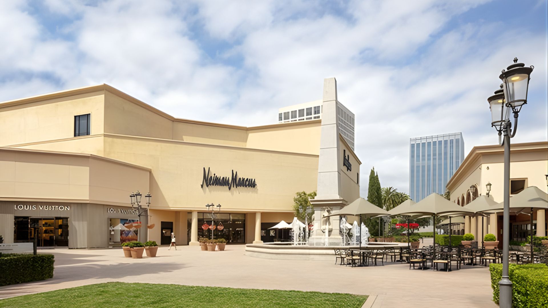 A view of the Mall at La Brea in Los Angeles, featuring stylish shops and outdoor seating areas bustling with visitors.