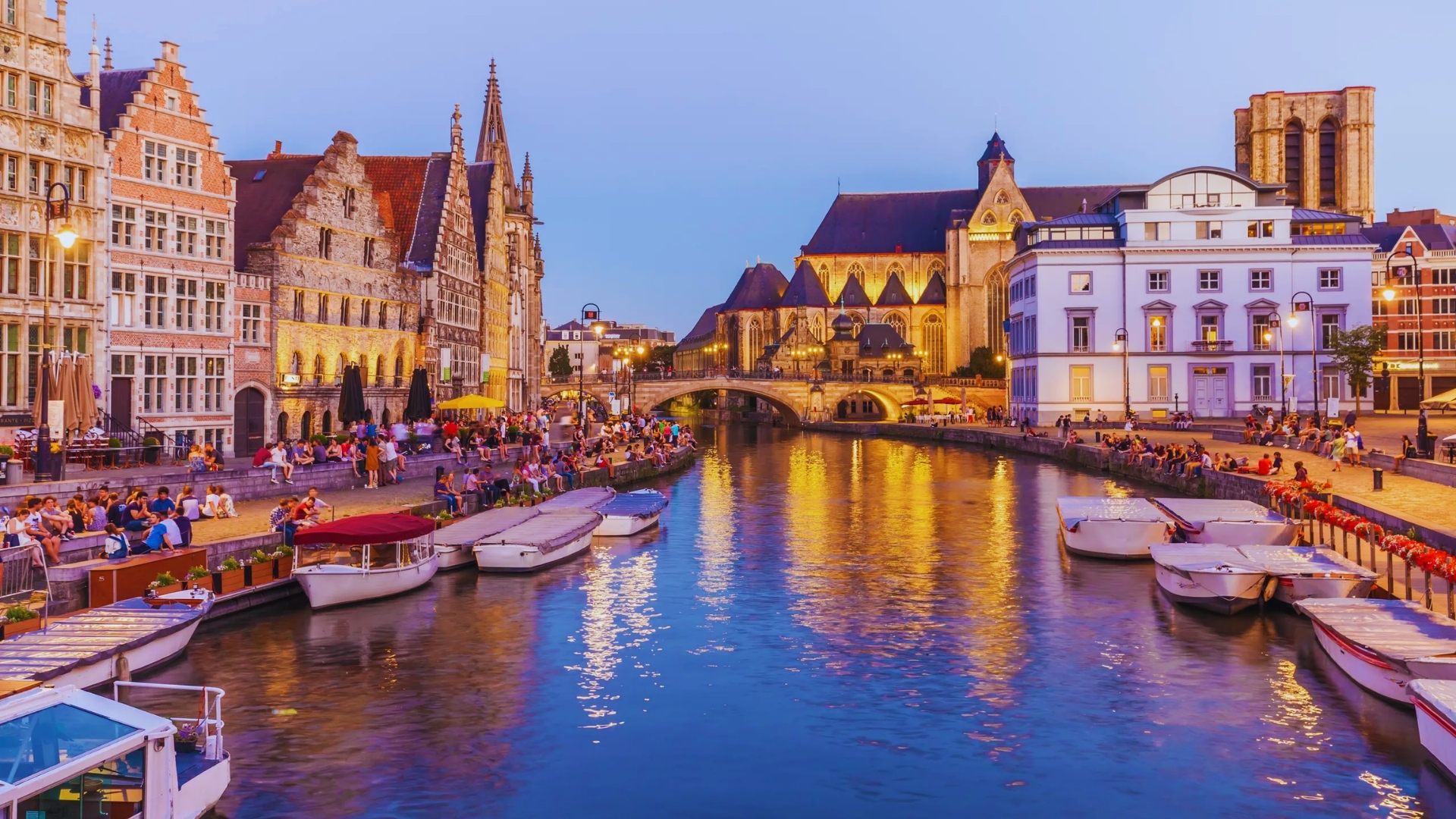 A panoramic image of Bruges, Belgium, highlighting its iconic canals and traditional Flemish architecture.