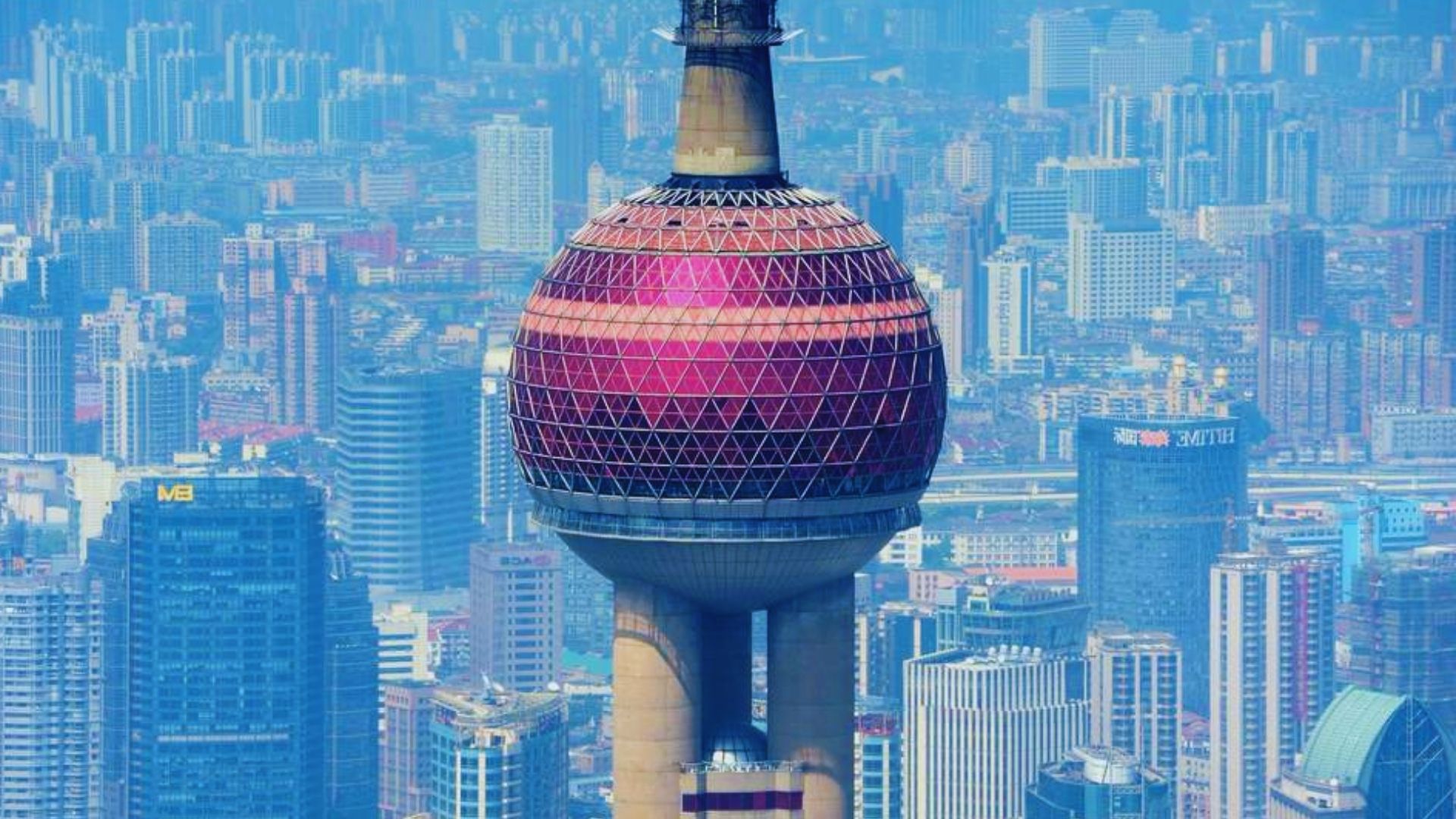 The iconic Oriental Pearl Tower in Shanghai, China, features its distinctive spheres and modern architecture.