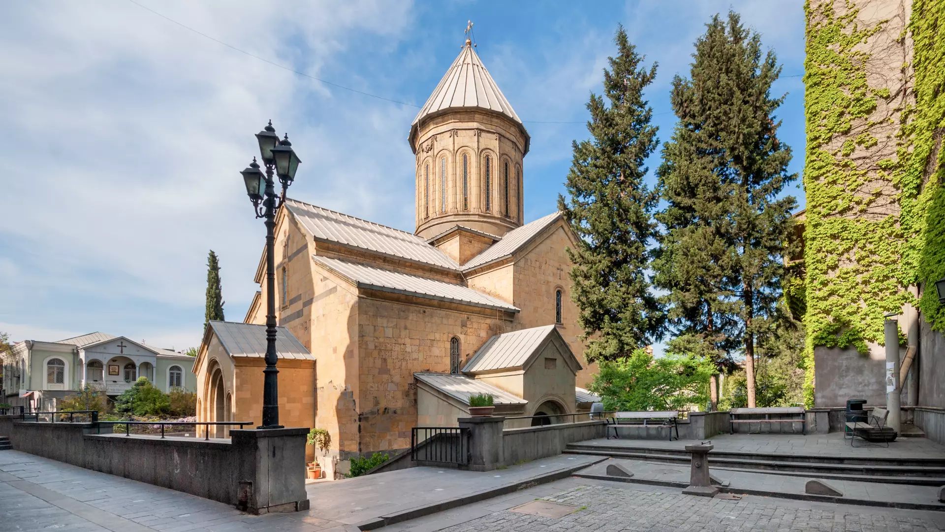 The Church of the Holy Cross in Armenia, showcasing its historic architecture and scenic surroundings.