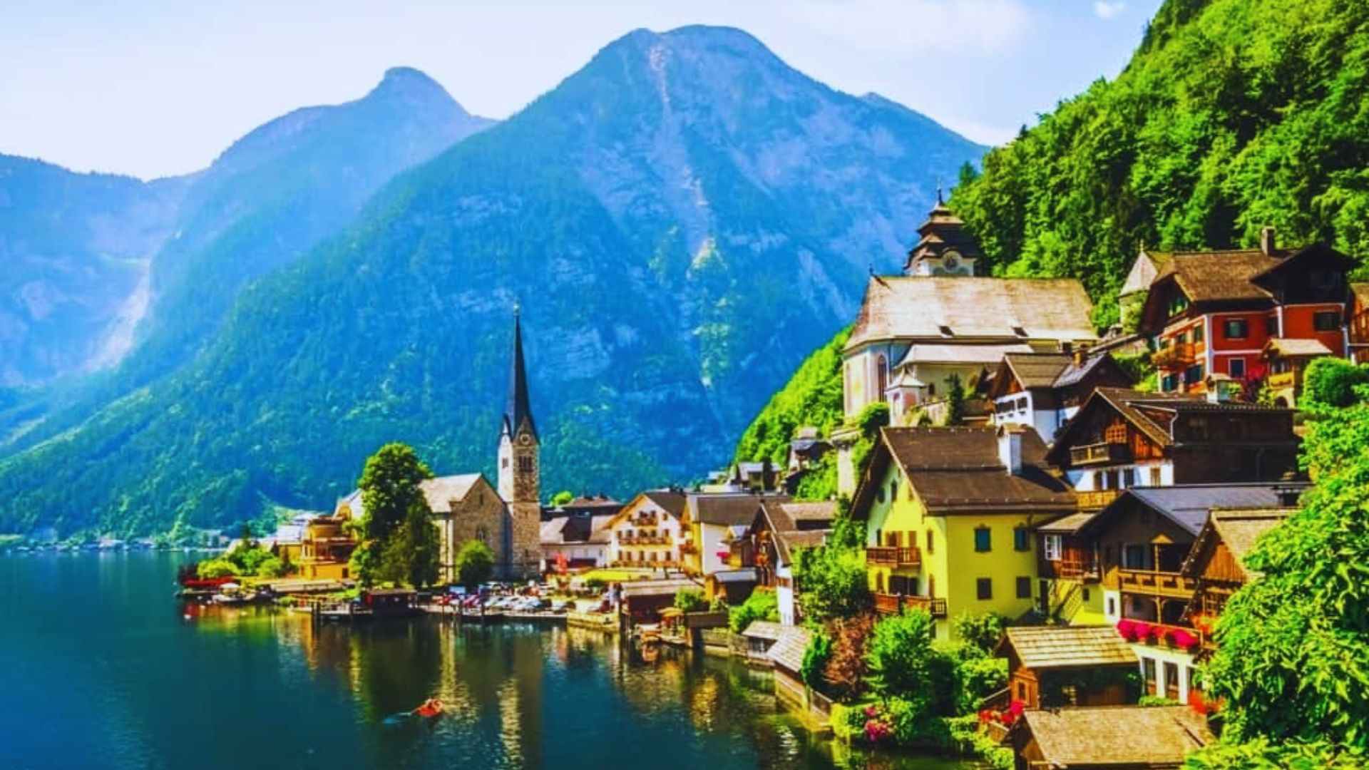 Beautiful landscape of Hallstatt, Austria, featuring the quaint village by the lake and dramatic alpine scenery.