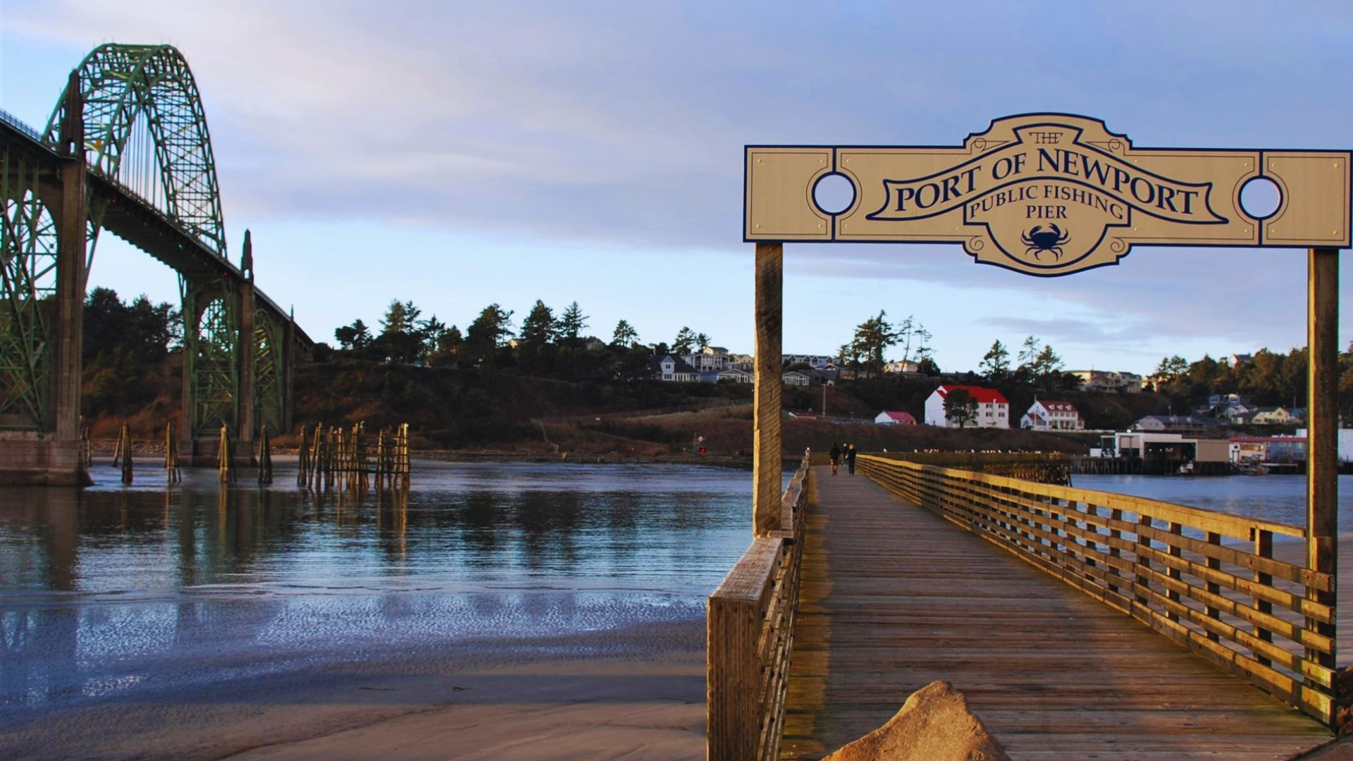 The Portland Harbor pier, with boats moored and a picturesque waterfront scene.