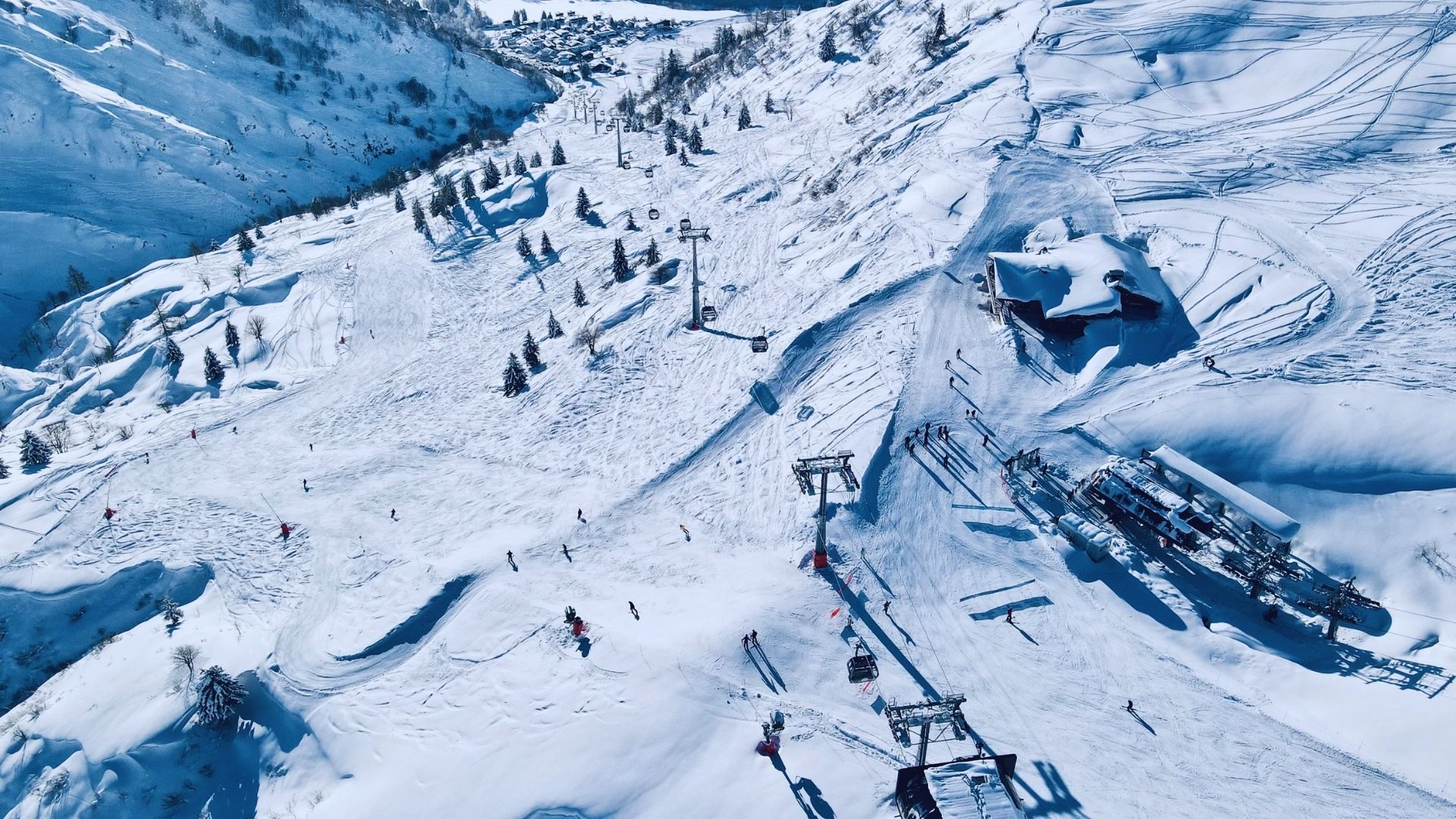 A pristine ski slope blanketed in fresh snow, ready for winter sports enthusiasts.