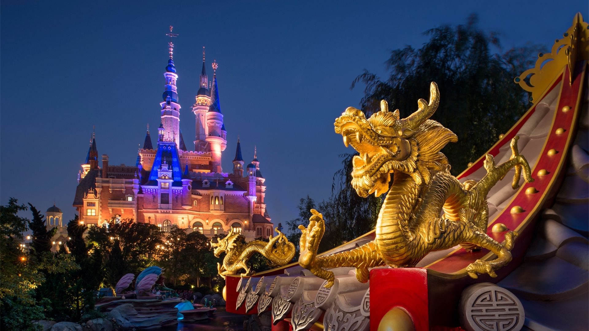 A dragon boat featuring a golden dragon sculpture prominently displayed on its bow.