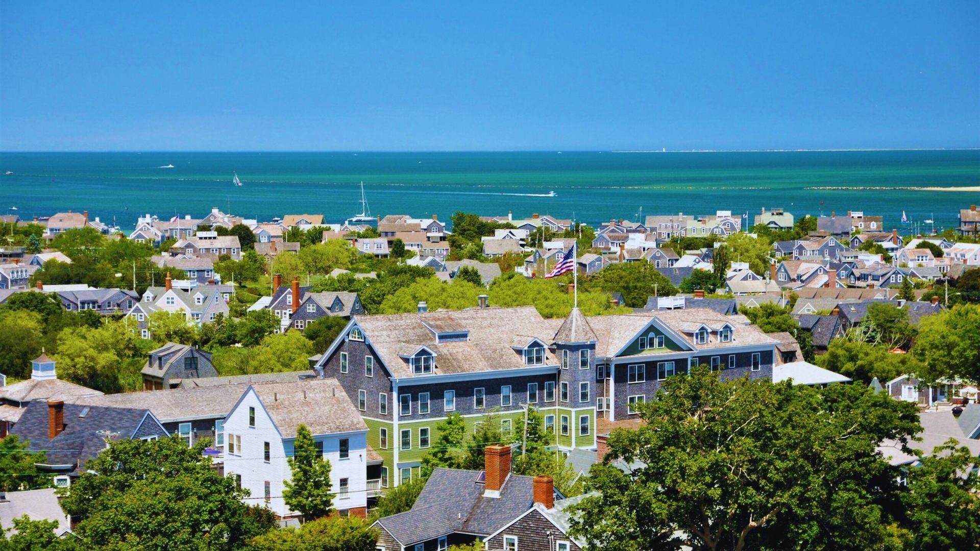 A scenic view of Cape Cod, Massachusetts, showcasing its charming town and coastal landscape.