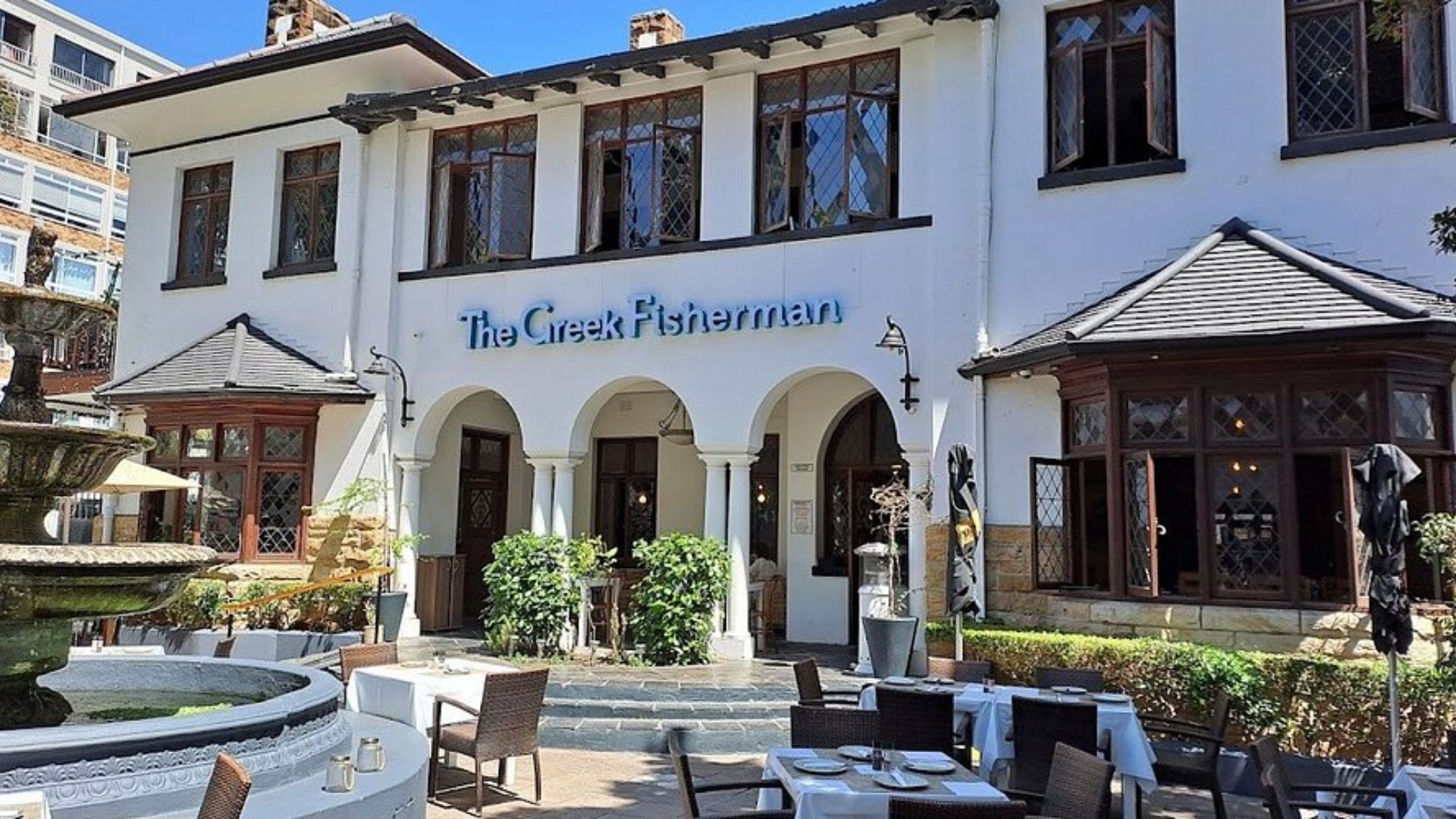 The Great Fishmonger restaurant exterior in Cape Town, showcasing its inviting entrance and coastal ambiance.