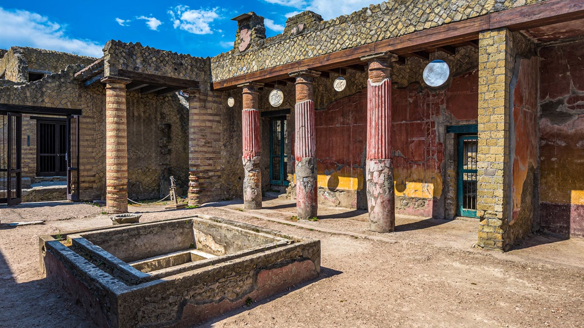 The ancient ruins of Pompeii, Italy, showcasing preserved structures and remnants of a once-thriving Roman city.