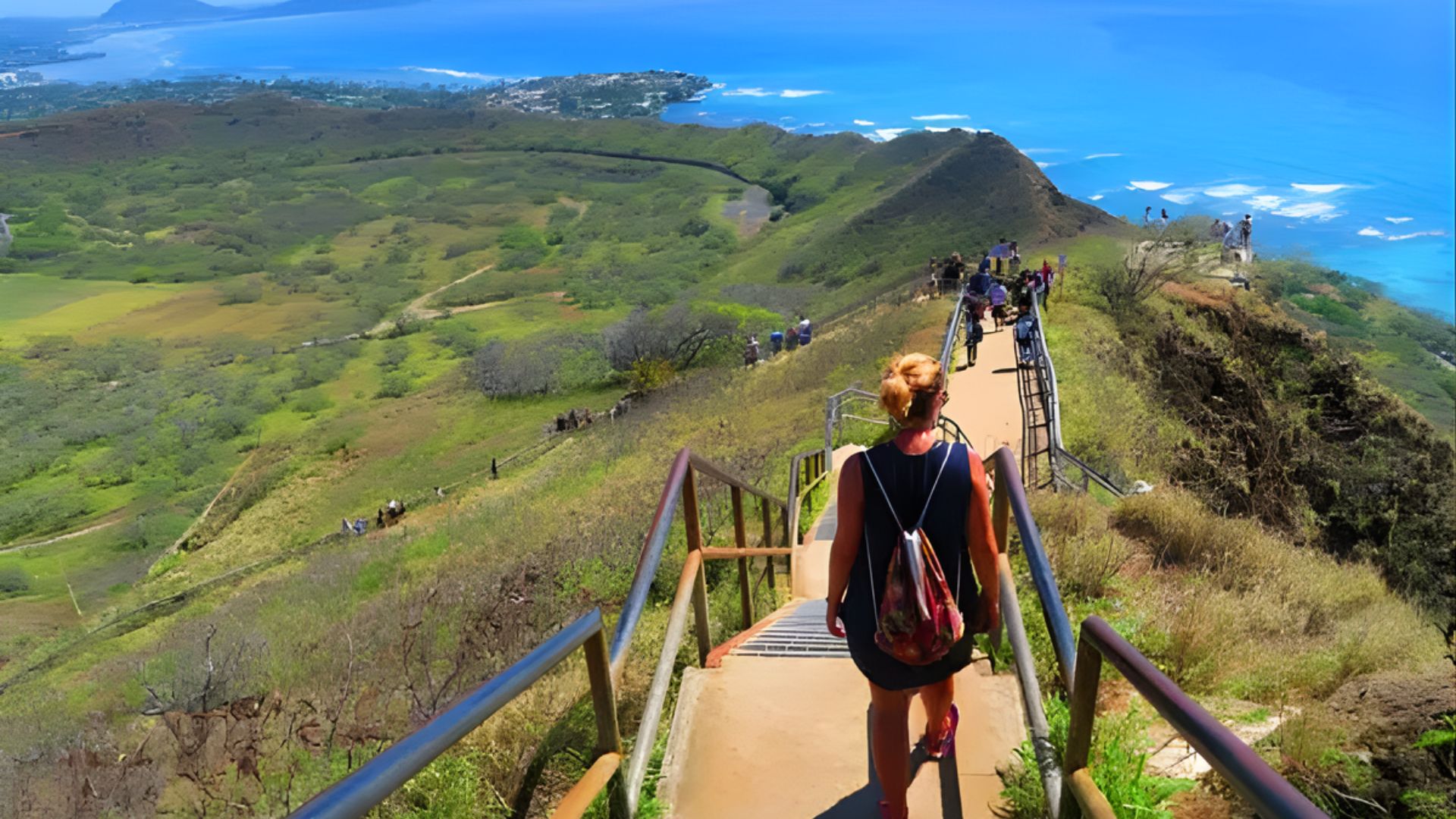 A woman ascends a steep mountain path, determined to reach the summit.