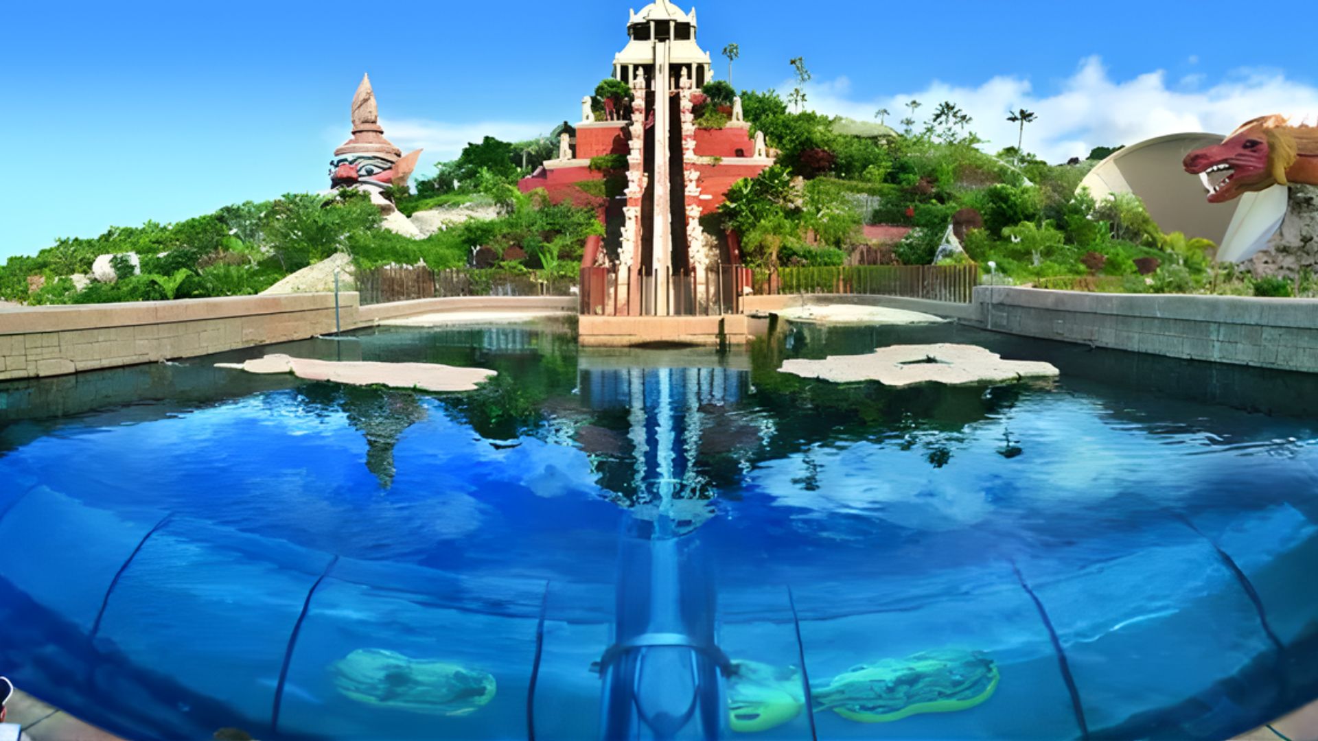 A vibrant water slide emerging from the edge of a swimming pool, inviting swimmers to enjoy a fun descent.