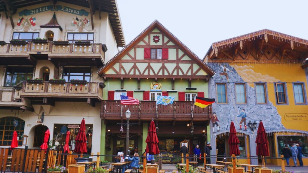 17 Things to Do in Leavenworth – Top Attractions A vibrant building with outdoor tables and chairs set up in front, inviting guests to enjoy the space.