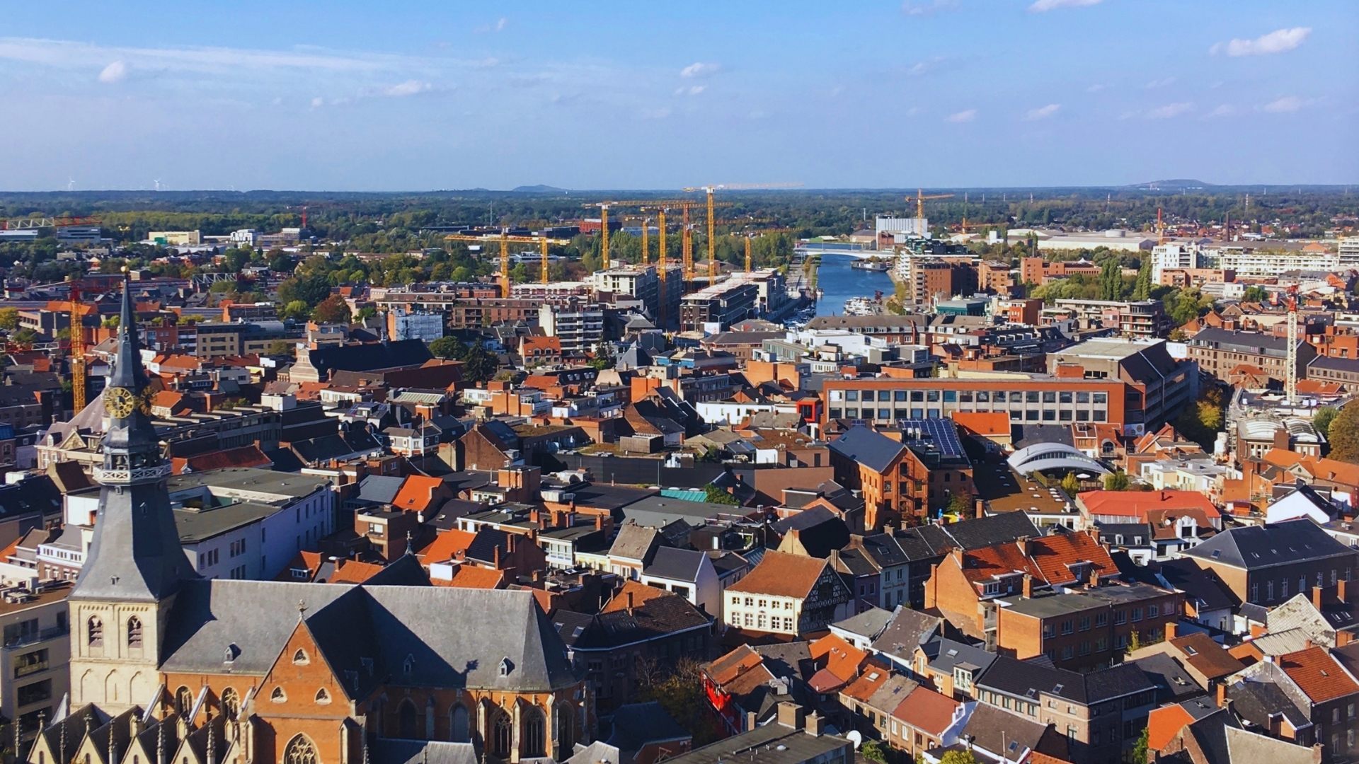 A scenic view of Bruges, Belgium, showcasing its historic architecture and picturesque canals.