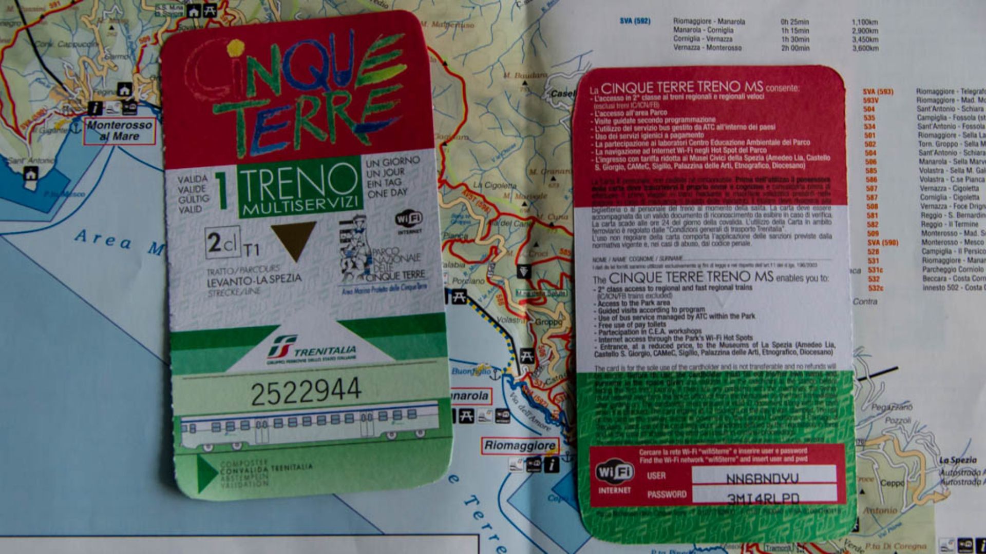 A travel map with a ticket placed on top, suggesting a planned journey or event.