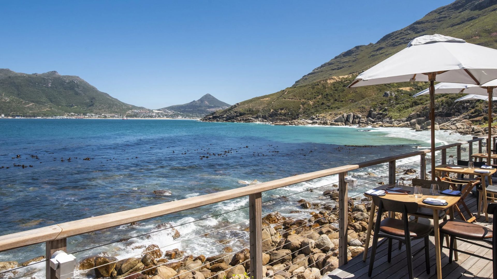 The dining area of the Cape Point Hotel, featuring elegant decor and ocean views.