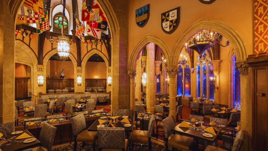 Elegant dining room at Disney's Hollywood Studios castle, featuring ornate decor and a grand atmosphere.
