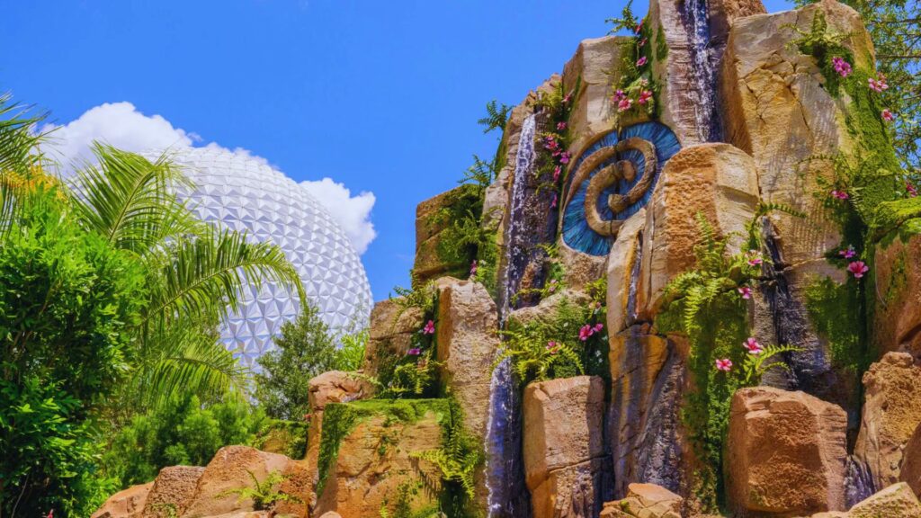 The Epcot Planetarium stands prominently in the background, showcasing its distinctive architectural design.