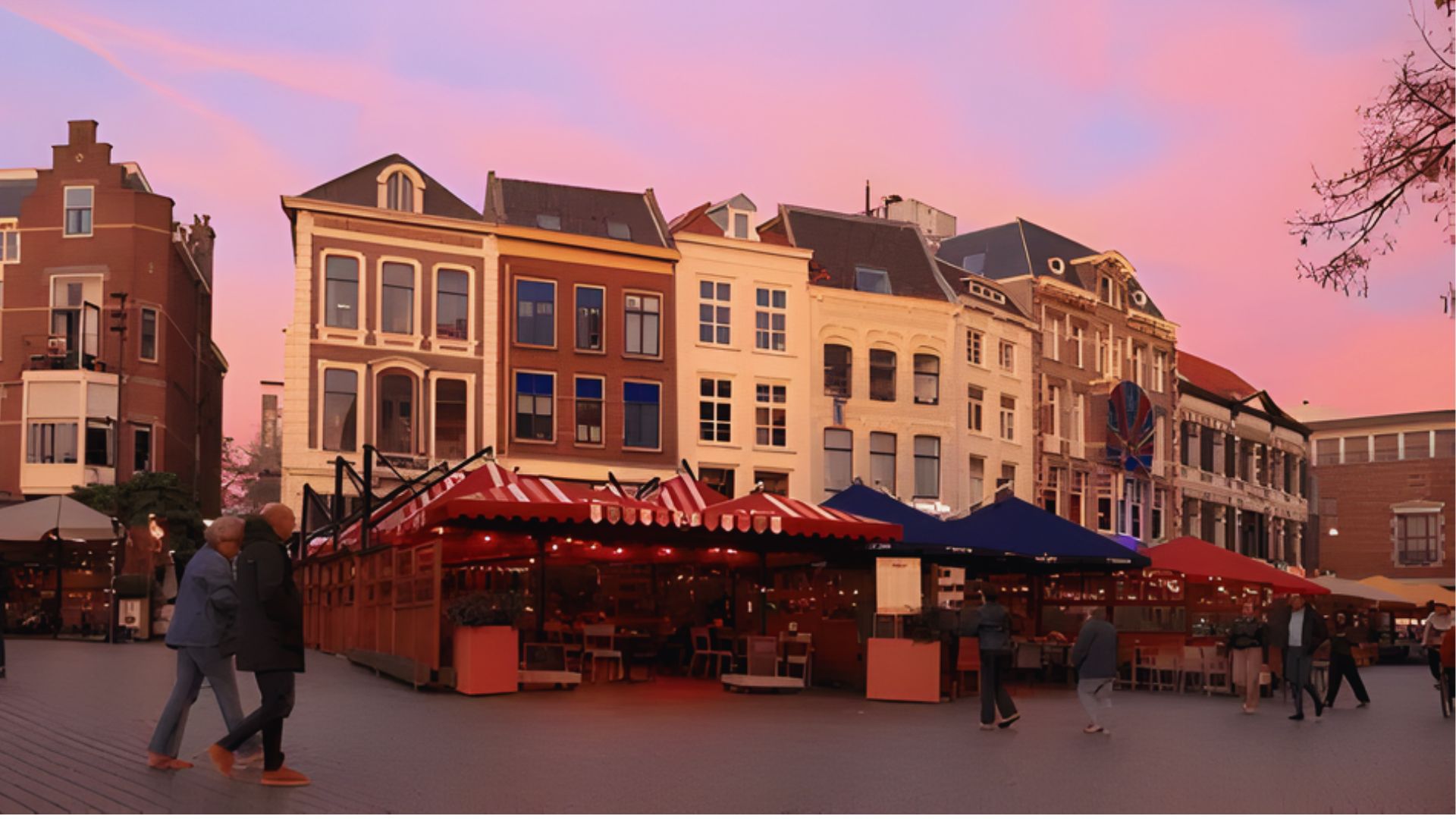 A row of charming European-style buildings with vibrant facades is set against a pink sunset sky. People stroll past outdoor cafes with colorful awnings, creating a calm and inviting atmosphere.