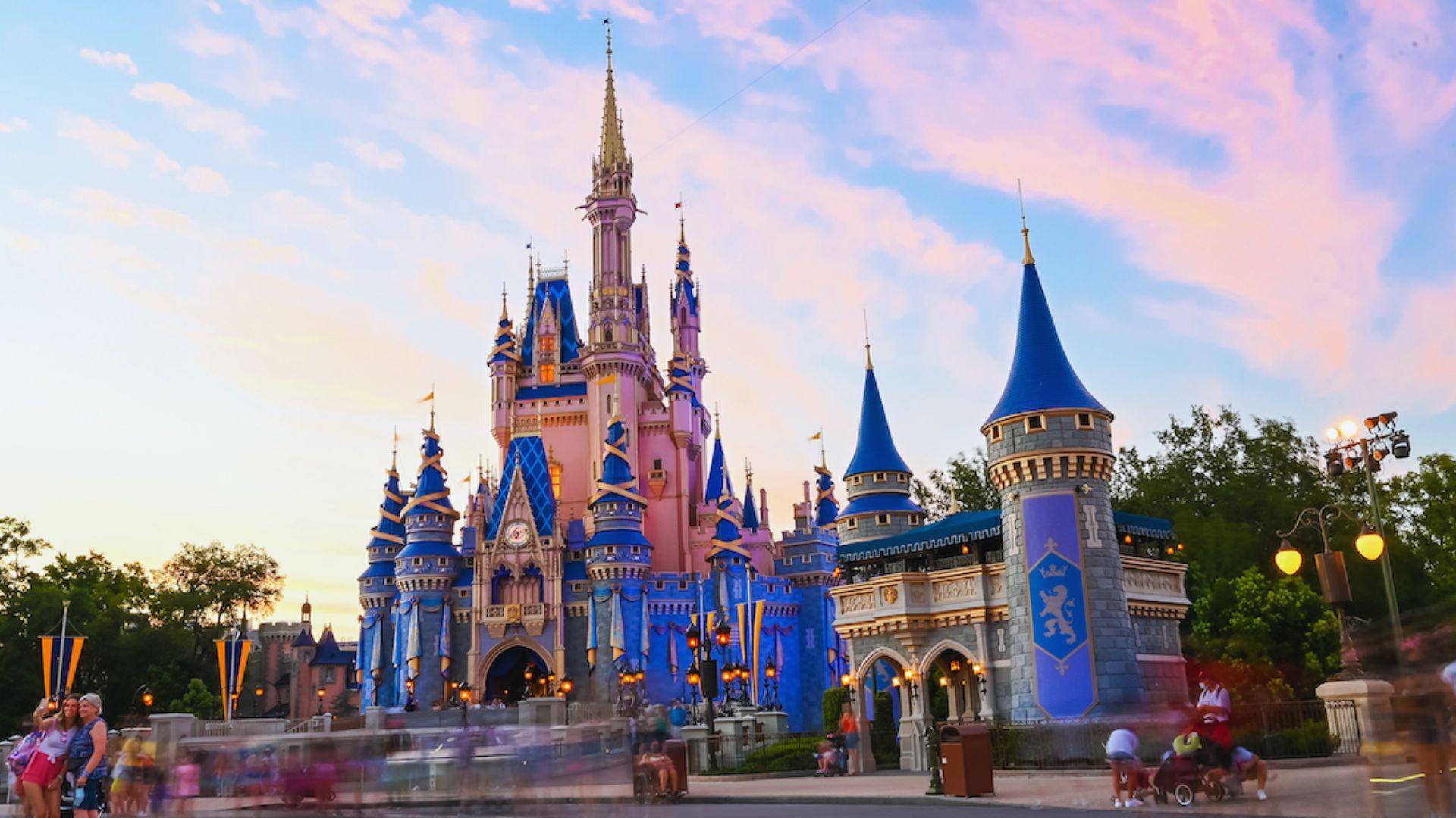 A vibrant view of Disneyland, showcasing its iconic attractions and joyful visitors enjoying the magical atmosphere.